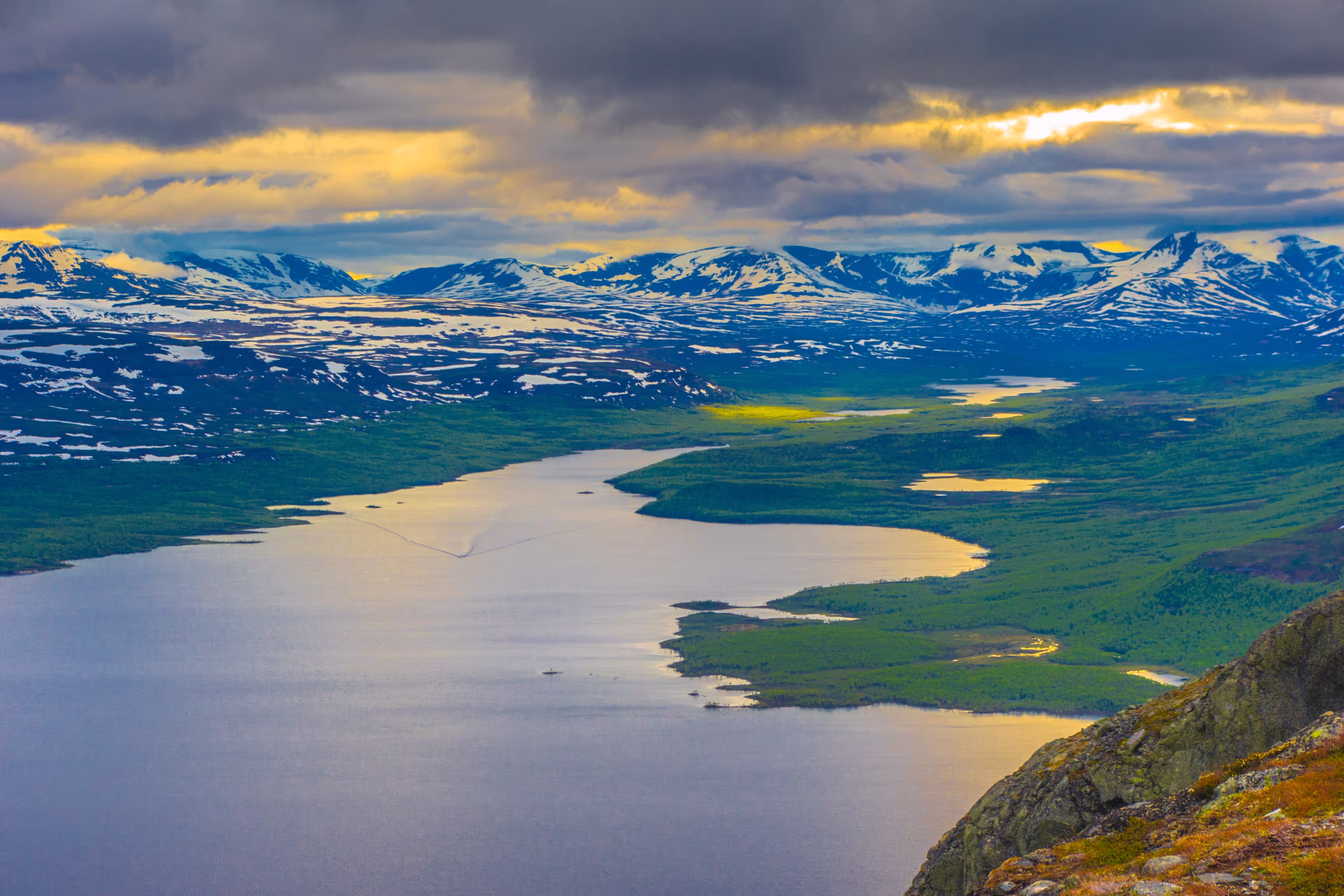 Lake Kilpisjärvi in Arctic Finland. Mountains in the background are already in Norway and Sweden