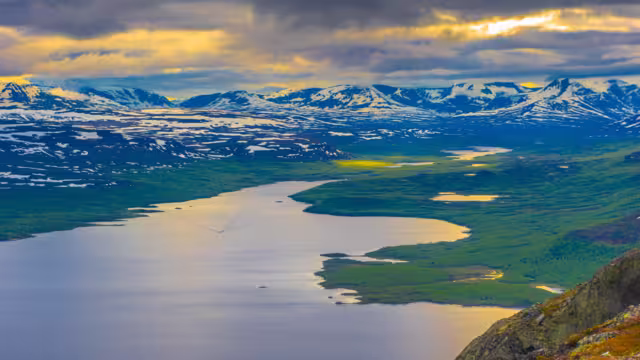 Lake Kilpisjärvi in Arctic Finland. Mountains in the background are already in Norway and Sweden