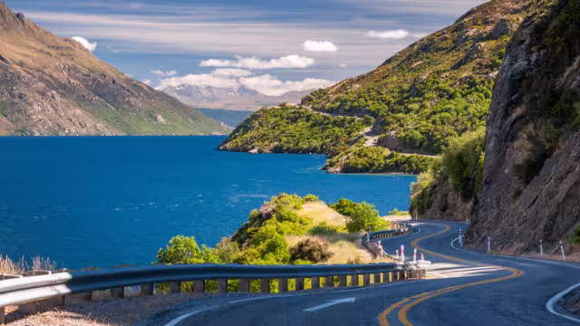 The winding road along the shore of Lake Wakatipu at Devils Staircase scenic lookout, not far from Queenstown, in the Southern Island of New Zealand.