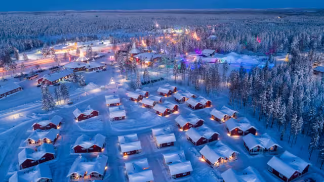 Aerial night view of Santa Claus Village in Rovaniemi in Lapland in Finland.
