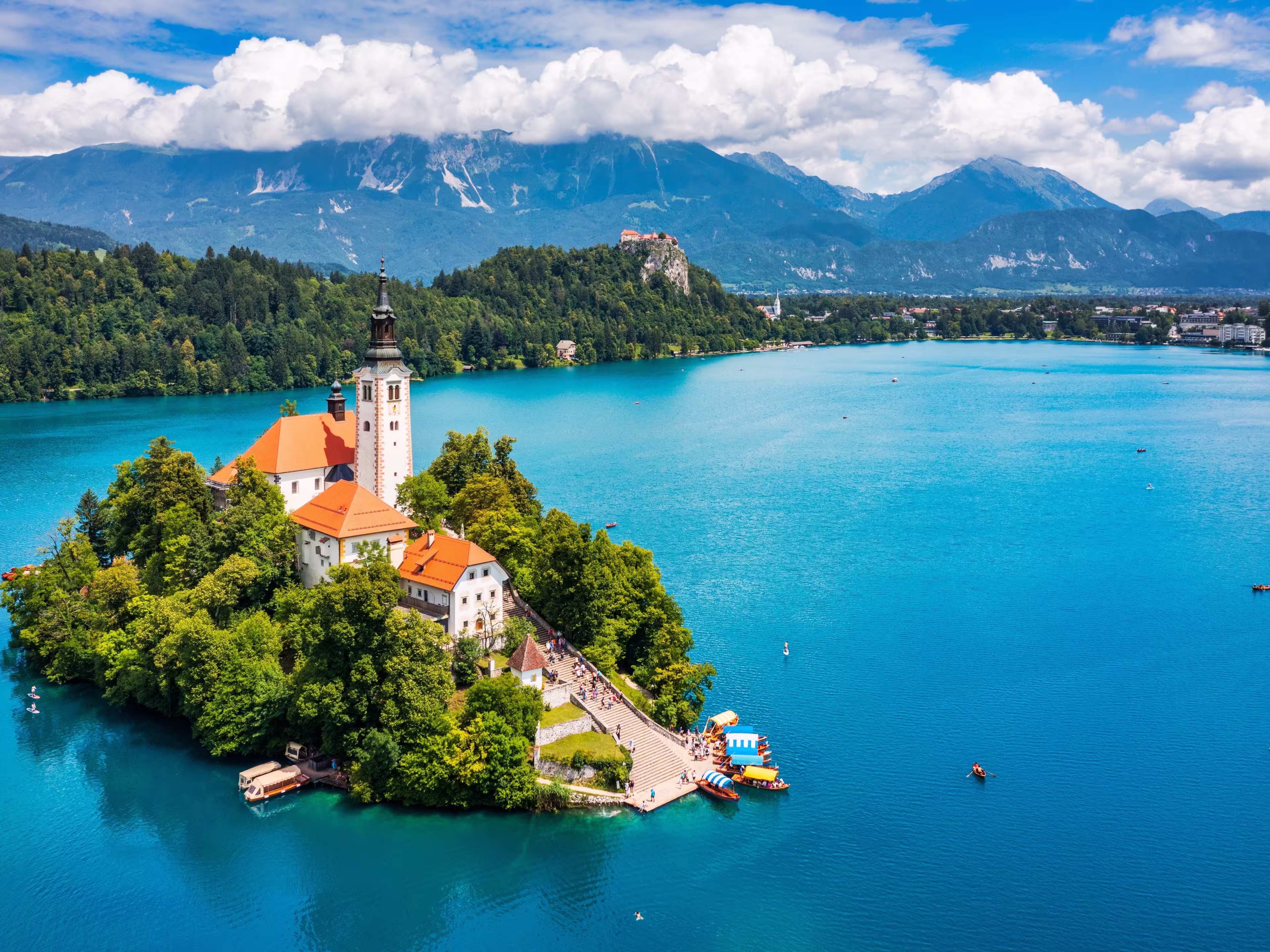 Lake Bled in Slovenia. Beautiful mountains and Bled lake with small Pilgrimage Church. Bled lake and island with Pilgrimage Church of the Assumption of Maria. Bled, Slovenia, Europe.