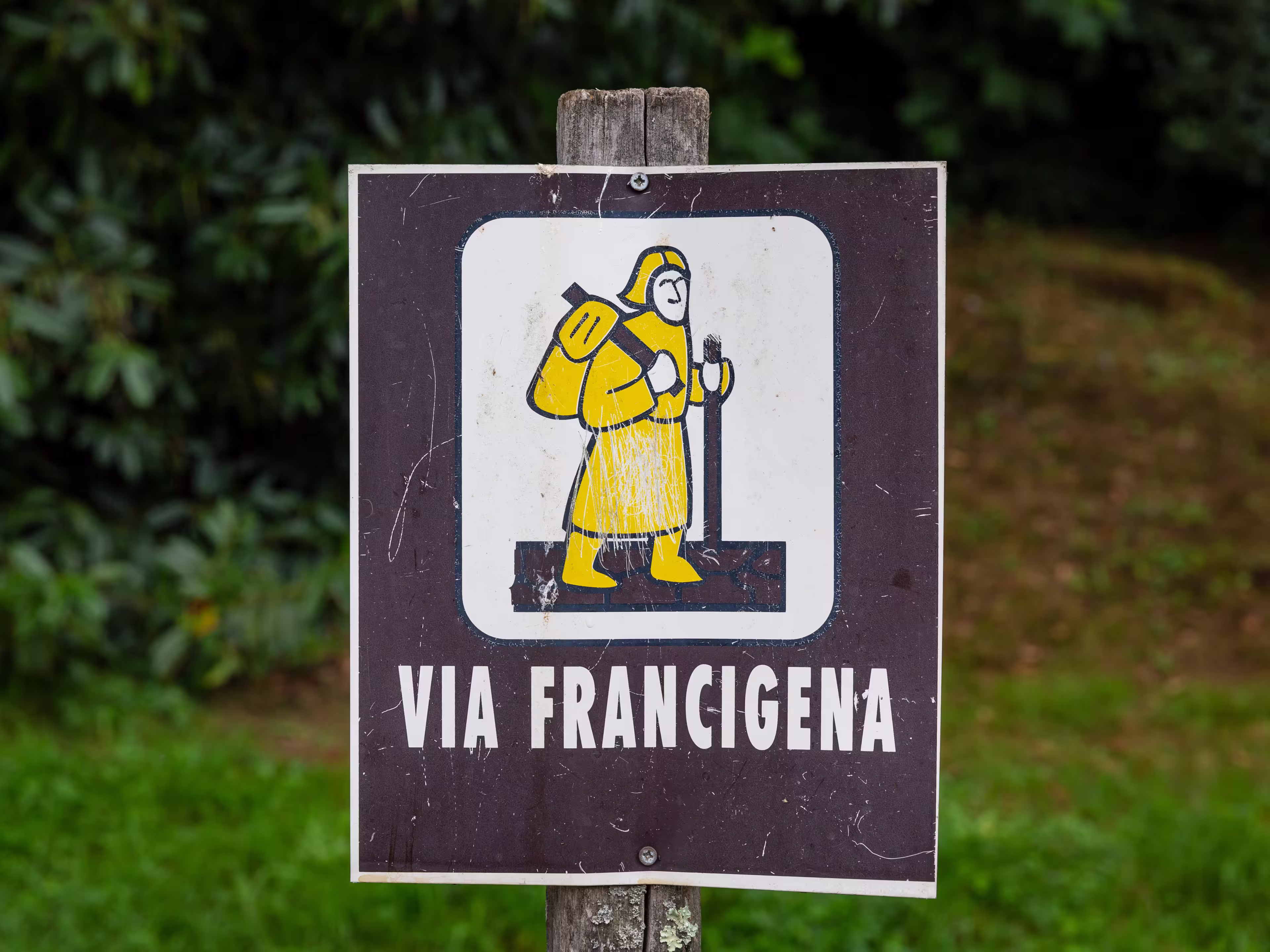 signpost of the Via Francigena (pilgrim's route to Rome) in the countryside