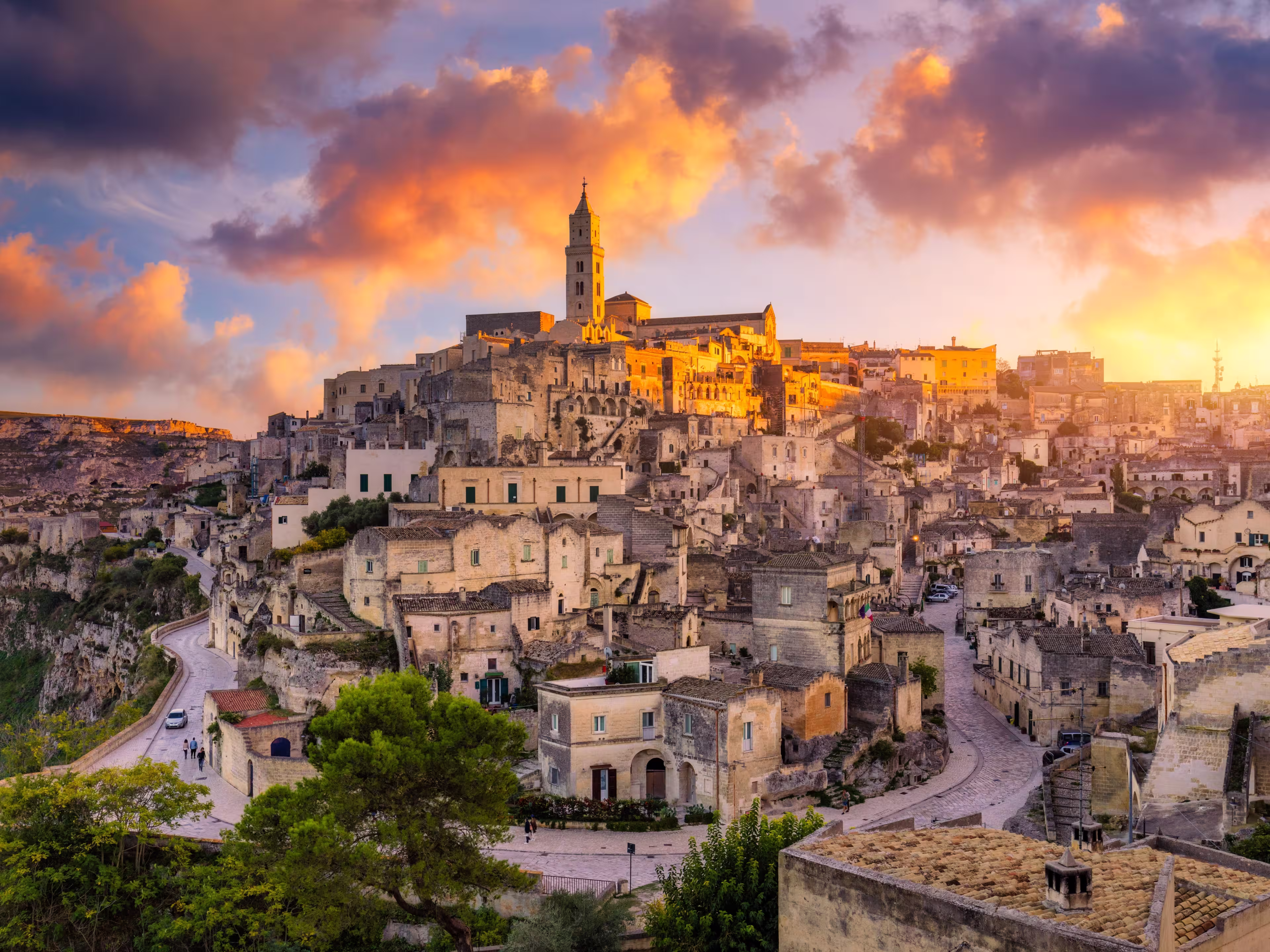 Panoramic view of the ancient town of Matera (Sassi di Matera) in a beautiful autumn day, Basilicata, southern Italy. Stunning view of the village of Matera. Matera is a city on a rocky outcrop.