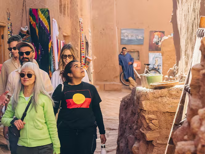 Travellers in the streets of Air Benhaddou, Morocco