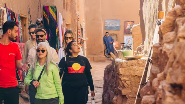 Travellers in the streets of Air Benhaddou, Morocco