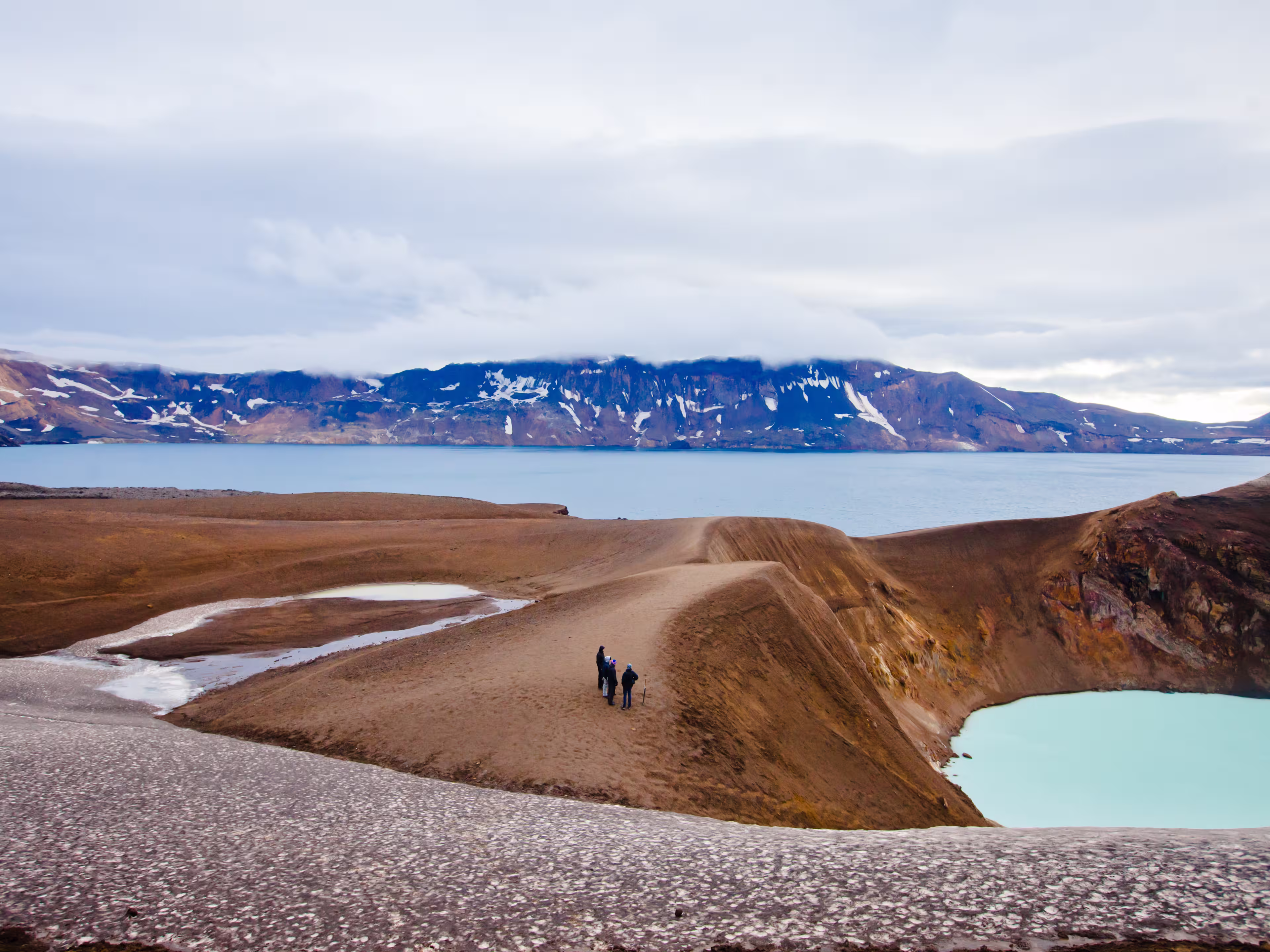 Giant volcano Askja offers a view at two crater lakes. The smaller, turquoise one is called Viti and contains warm geothermal water and is good for swimming.