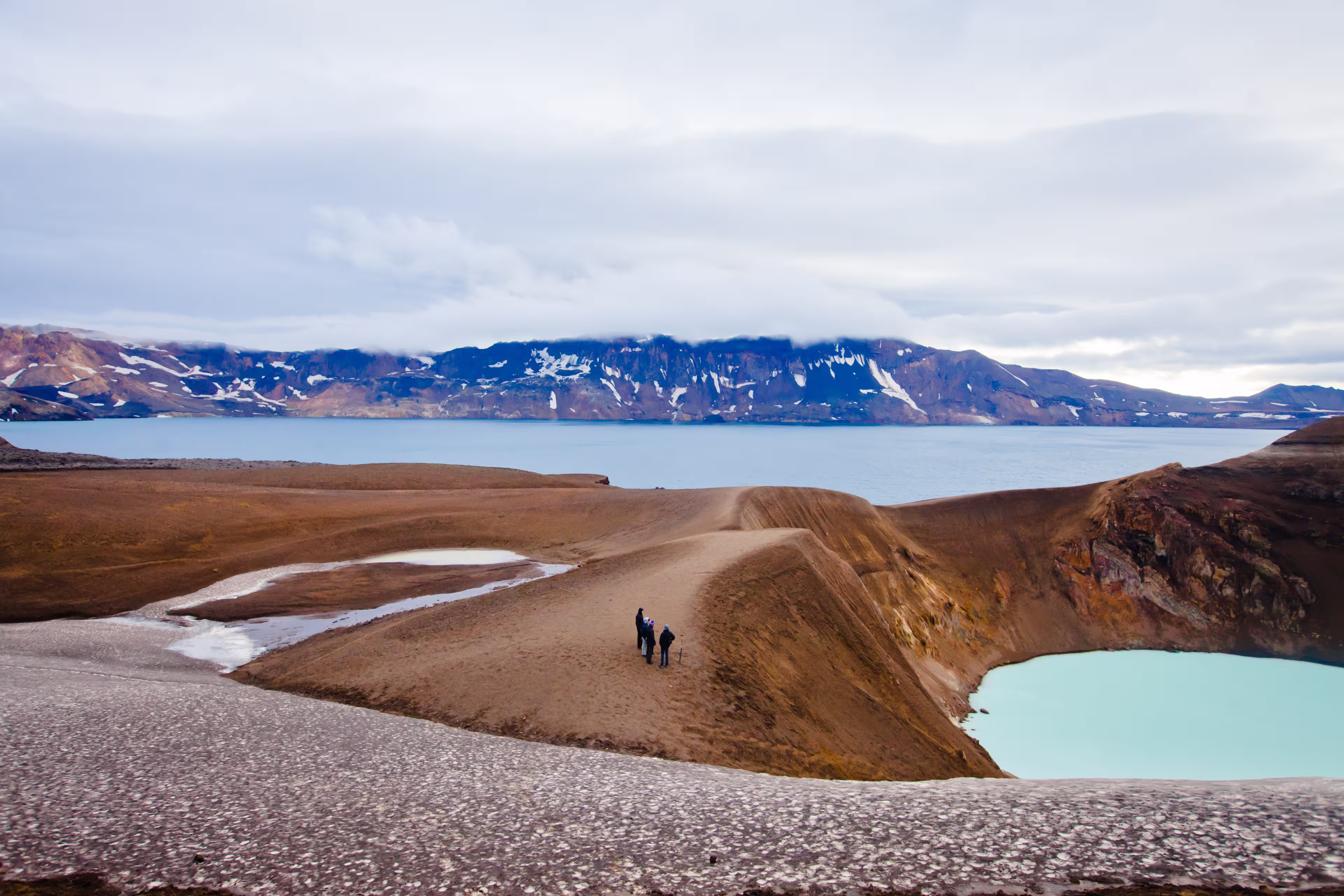 Giant volcano Askja offers a view at two crater lakes. The smaller, turquoise one is called Viti and contains warm geothermal water and is good for swimming.