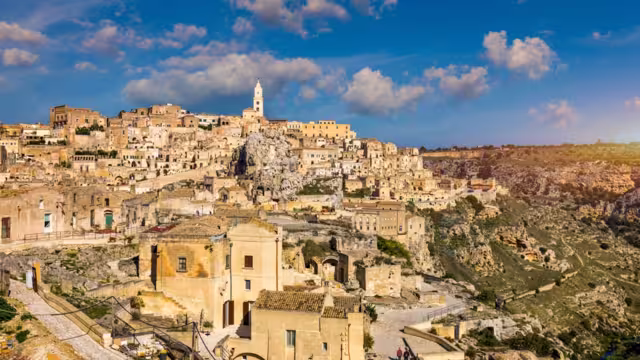 Panoramic view of the ancient town of Matera (Sassi di Matera) in a beautiful autumn day, Basilicata, southern Italy. Stunning view of the village of Matera. Matera is a city on a rocky outcrop.