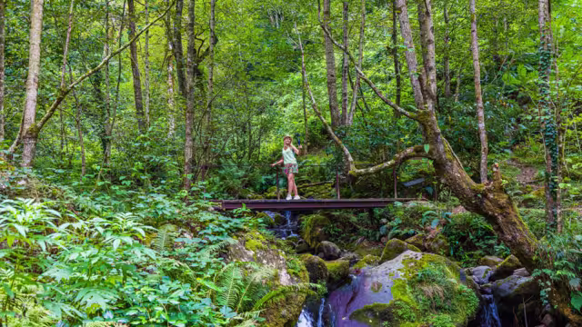 Girl traveler visits Mtirala National Park, Georgia, Adjara