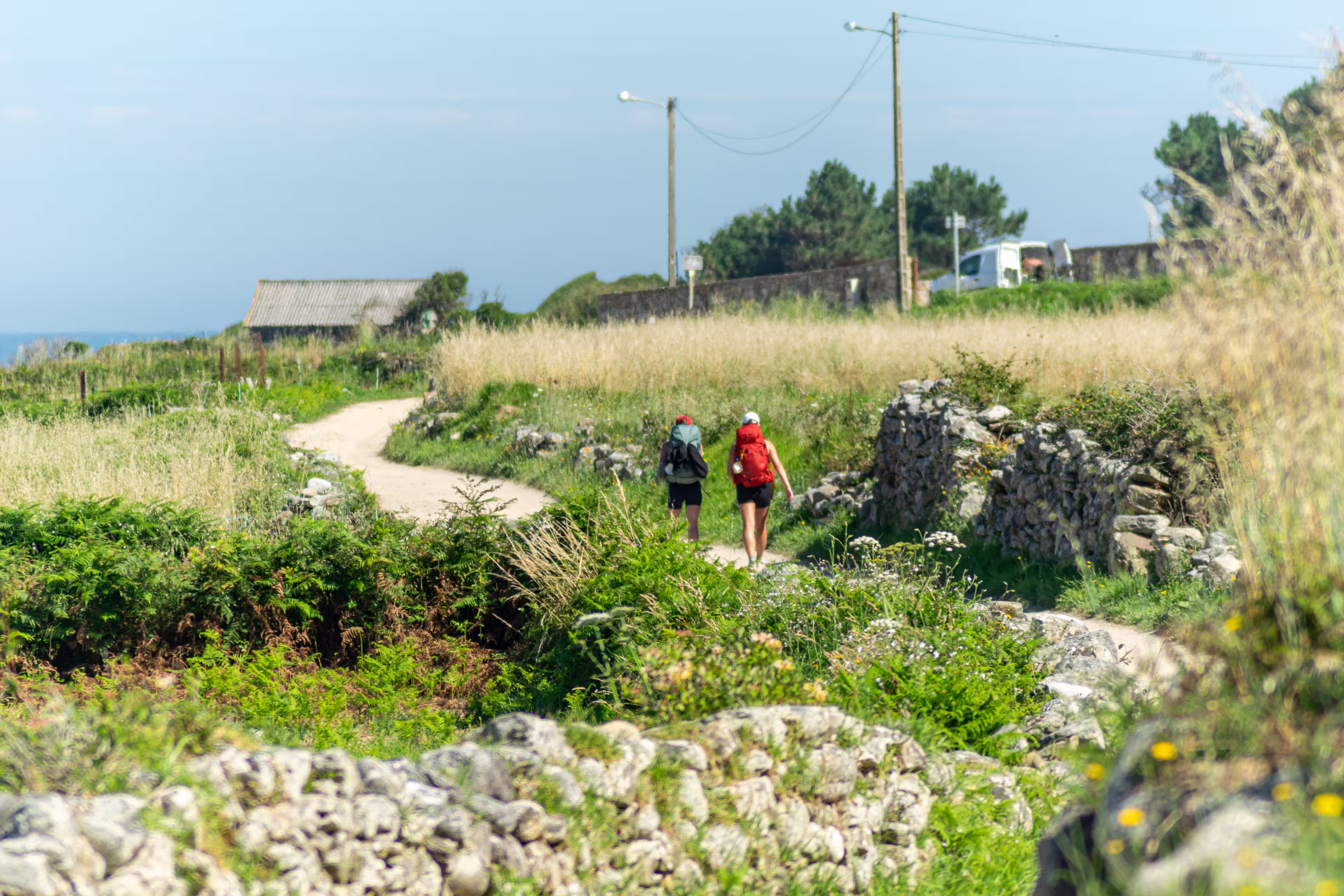 two pilgrims making the Way of St. James along the coast from Portugal