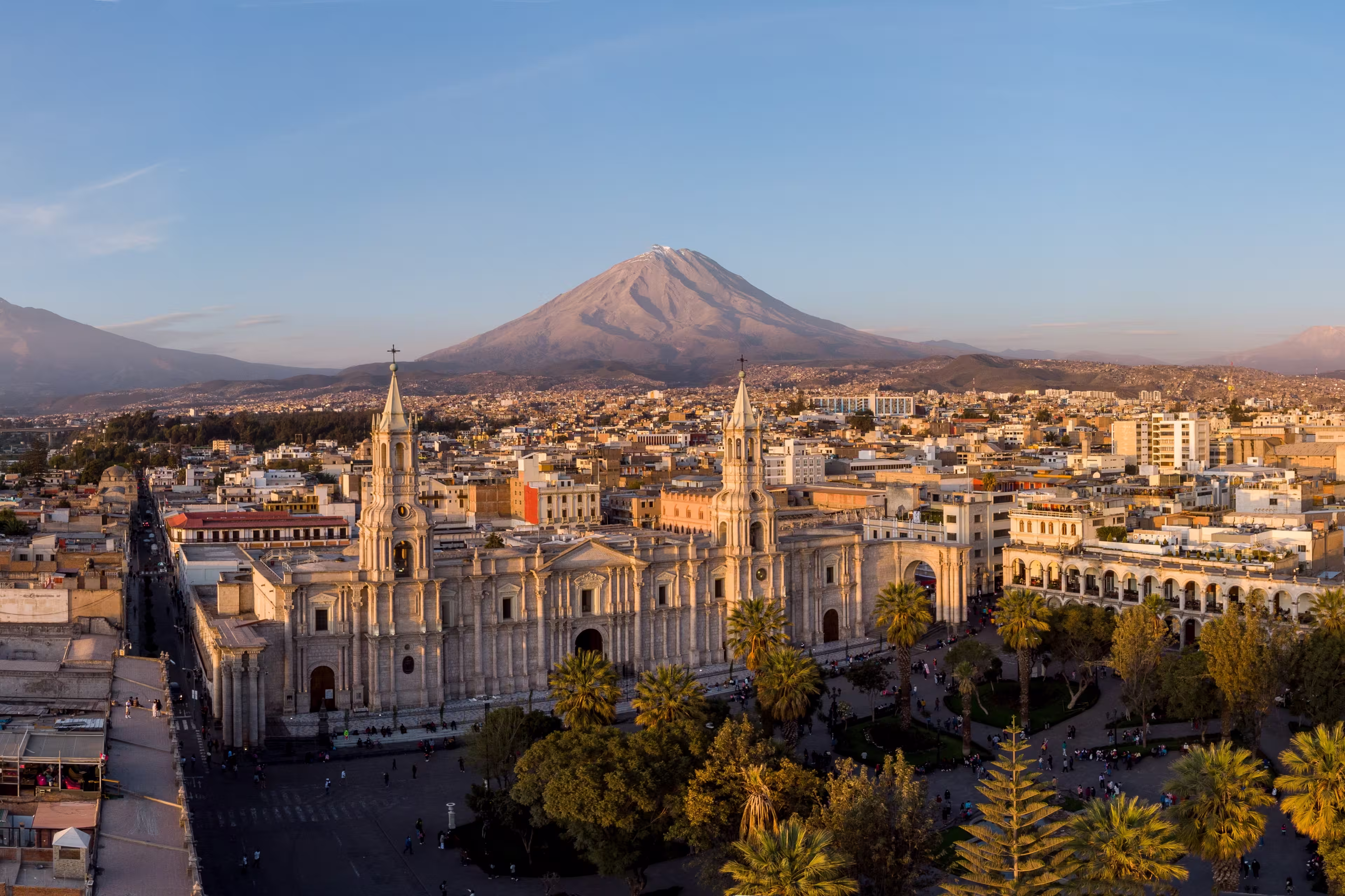 Arequipa, Peru: Panoramic view of the Basilica Cathedral of Arequipa and the Plaza de Armas in the colonial old town in Peru at sunset
