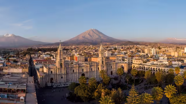 Arequipa, Peru: Panoramic view of the Basilica Cathedral of Arequipa and the Plaza de Armas in the colonial old town in Peru at sunset