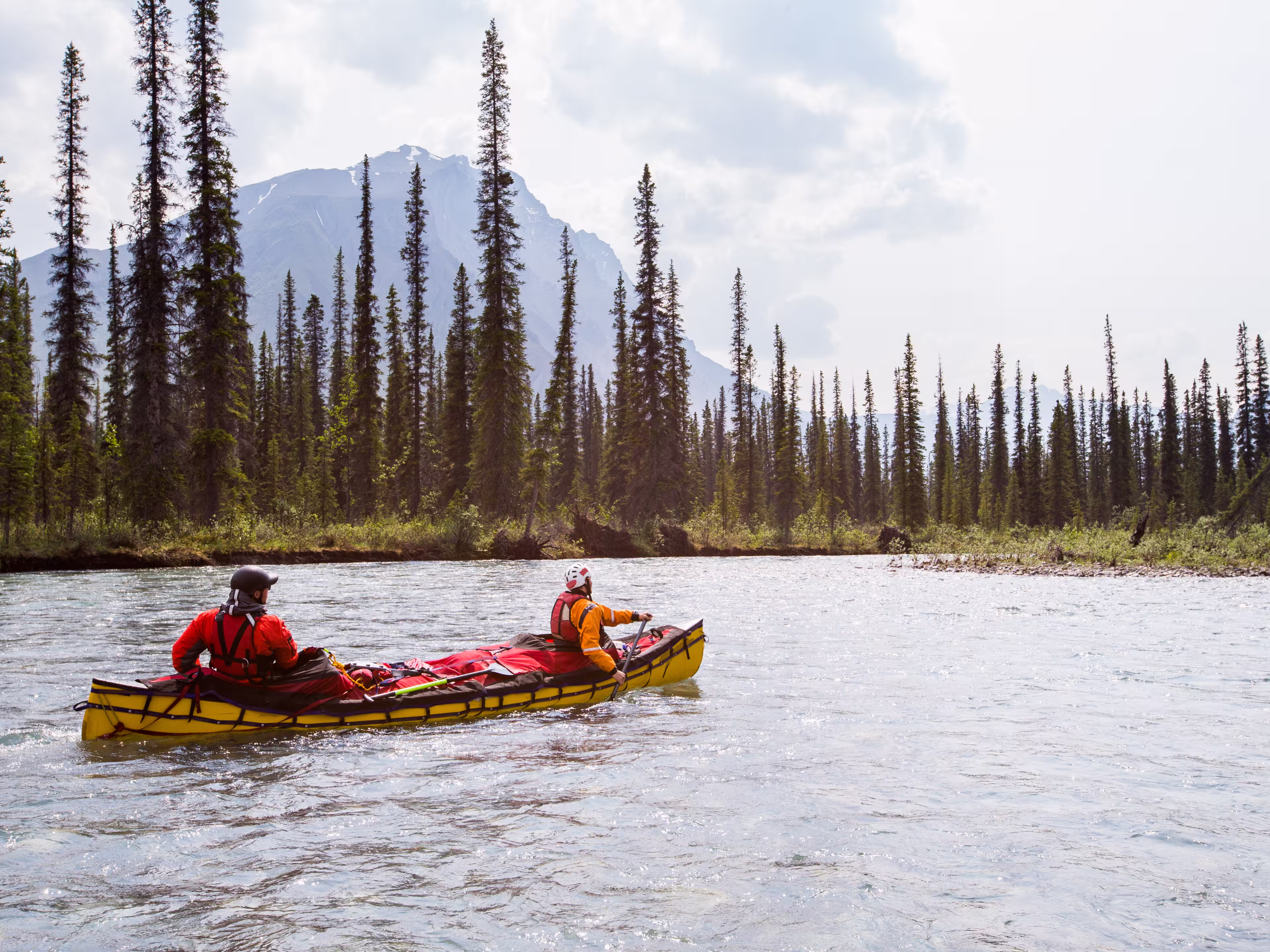 Two young men on a multi-day trip on a river in the far north of North America.
