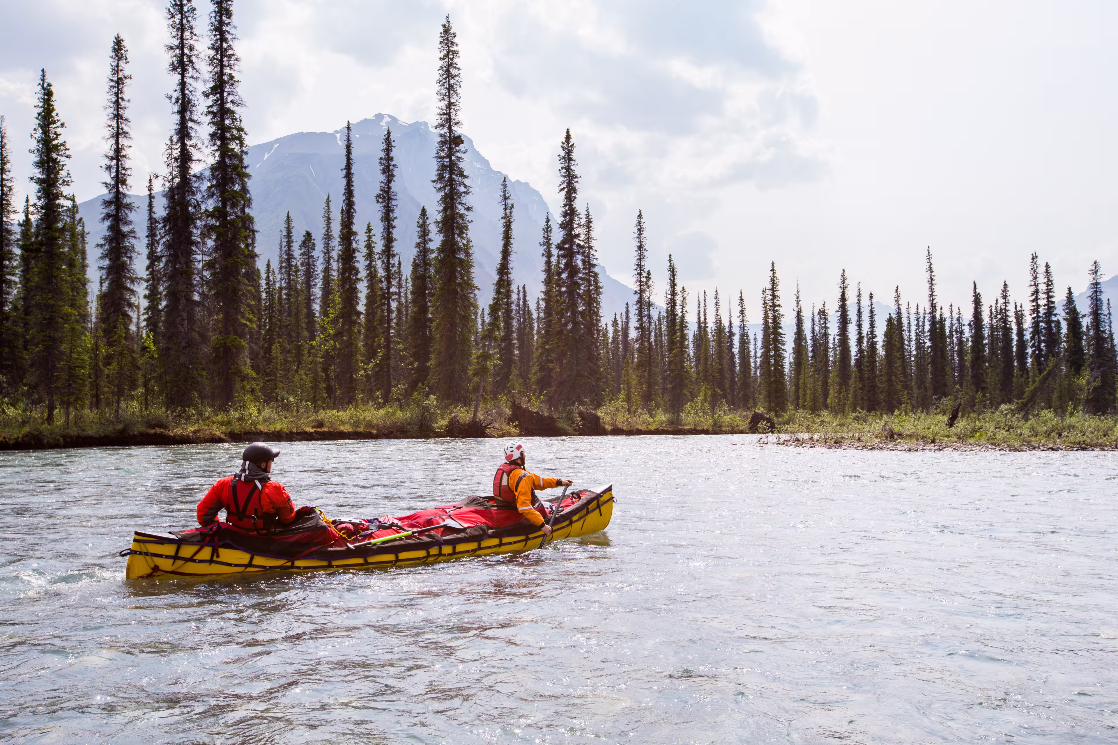 Two young men on a multi-day trip on a river in the far north of North America.