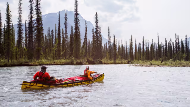 Two young men on a multi-day trip on a river in the far north of North America.