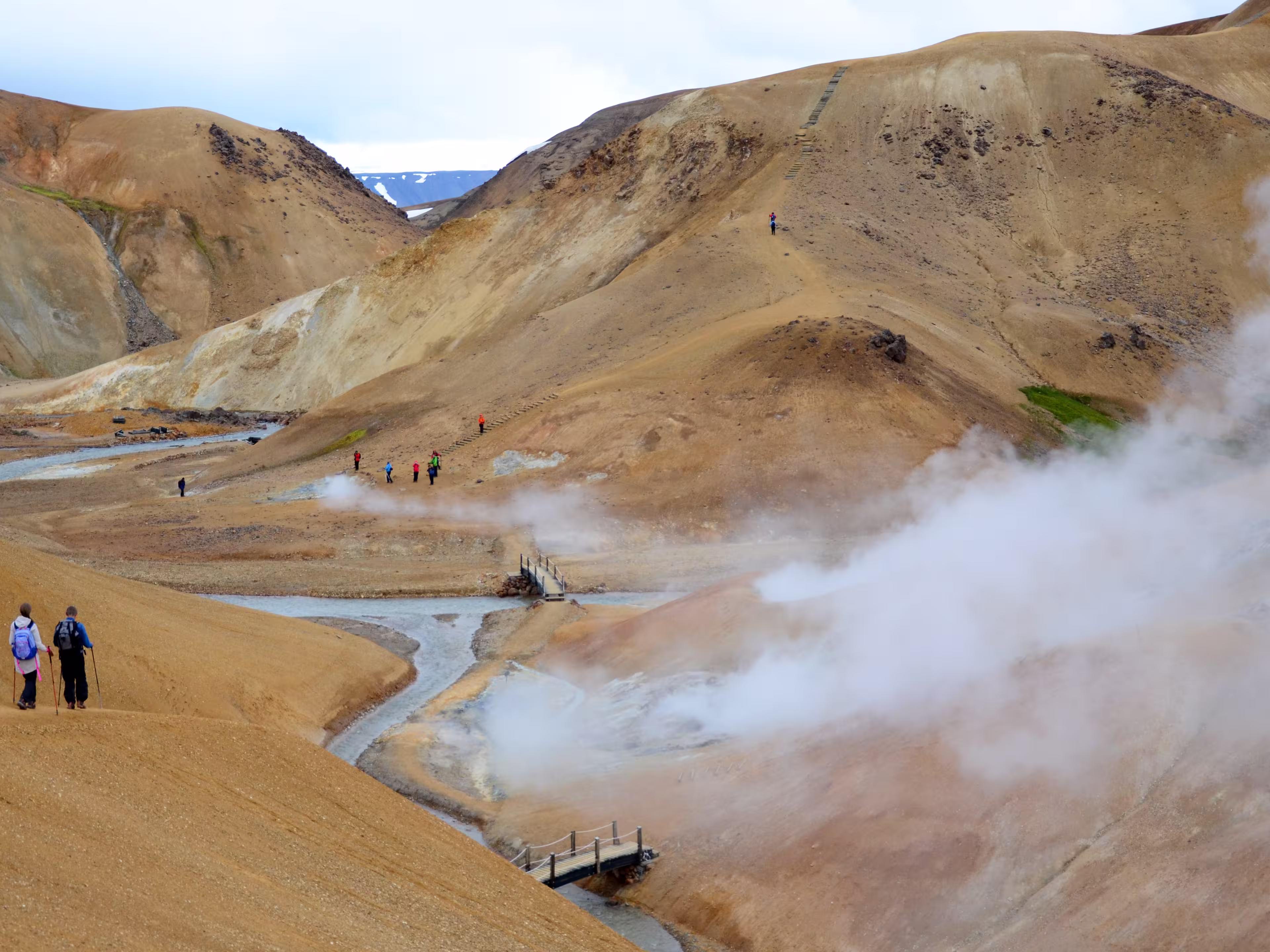 Valley of geysers in the mountains Kerlingarfjöll with hot smoking hot springs popular place for hiking in Iceland in summer