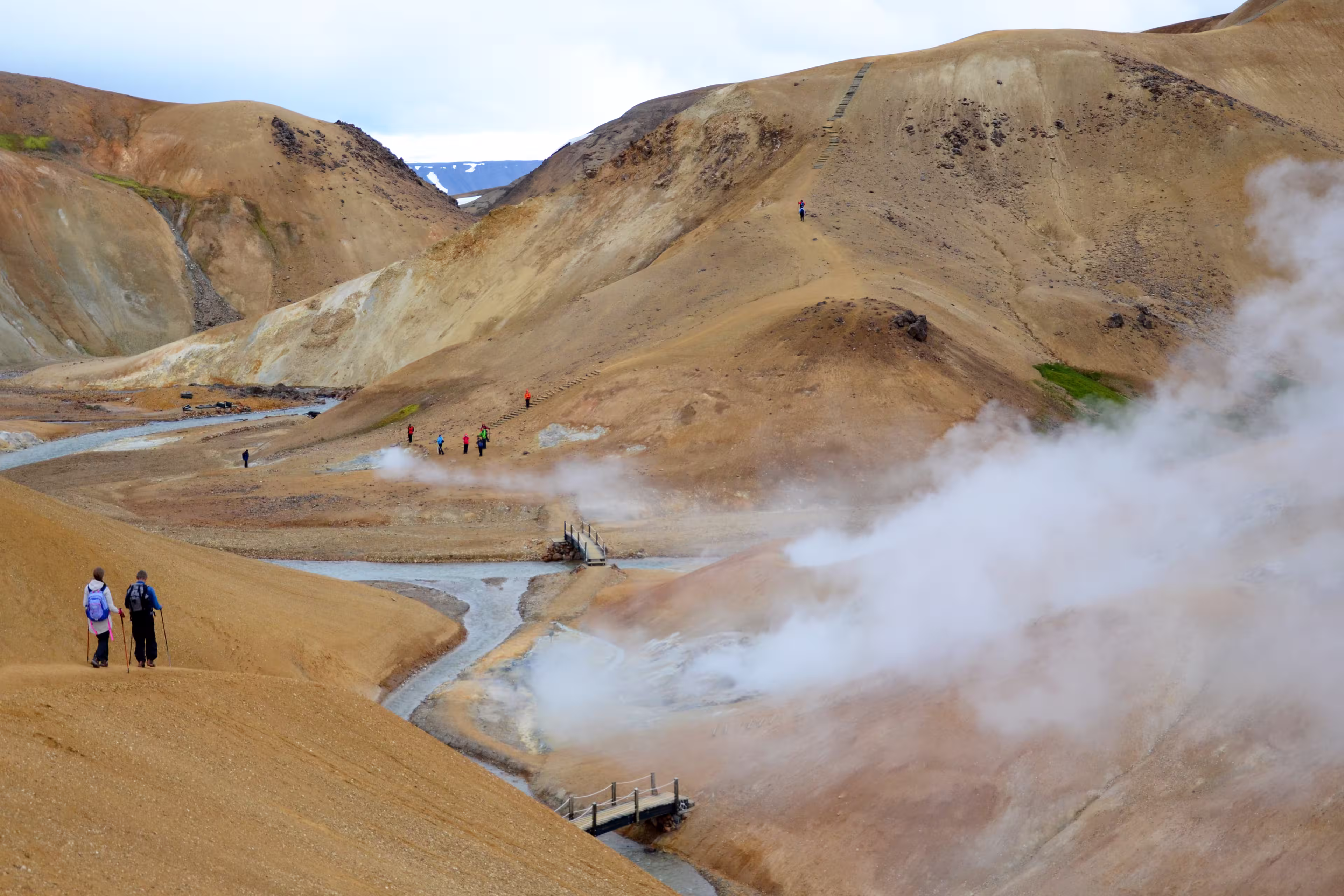Valley of geysers in the mountains Kerlingarfjöll with hot smoking hot springs popular place for hiking in Iceland in summer