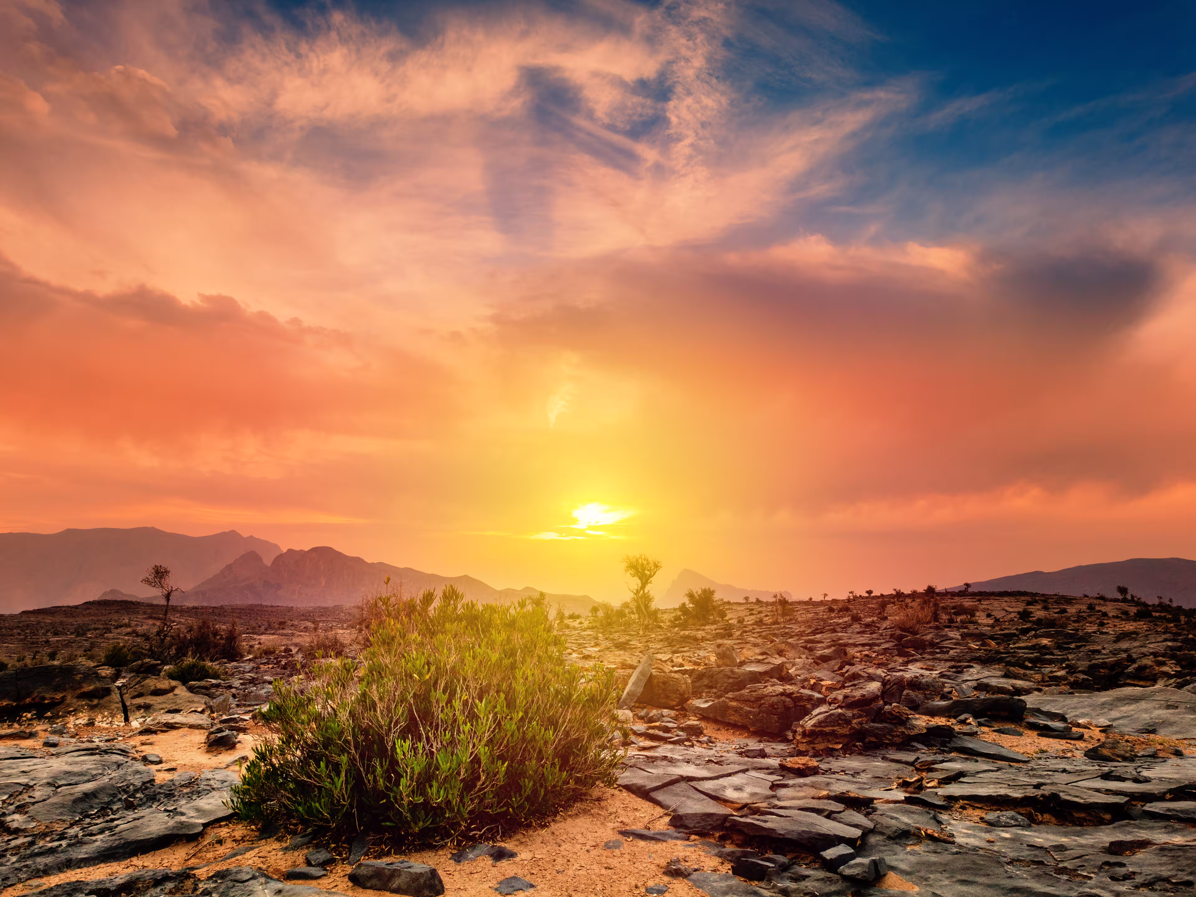 Beautiful view of sunset from a plateau on Jebel Shams Mountain in Oman
