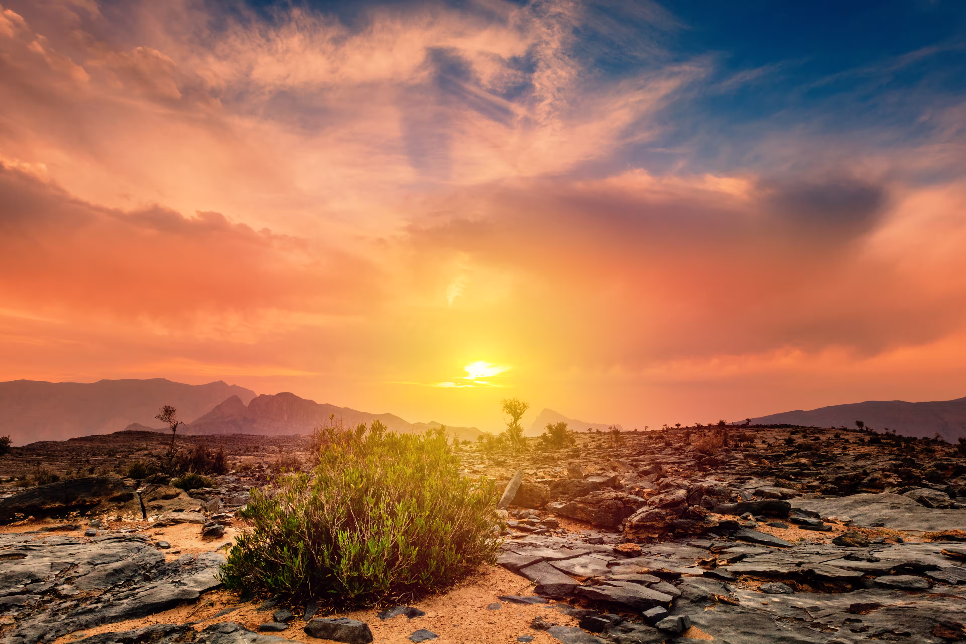Beautiful view of sunset from a plateau on Jebel Shams Mountain in Oman