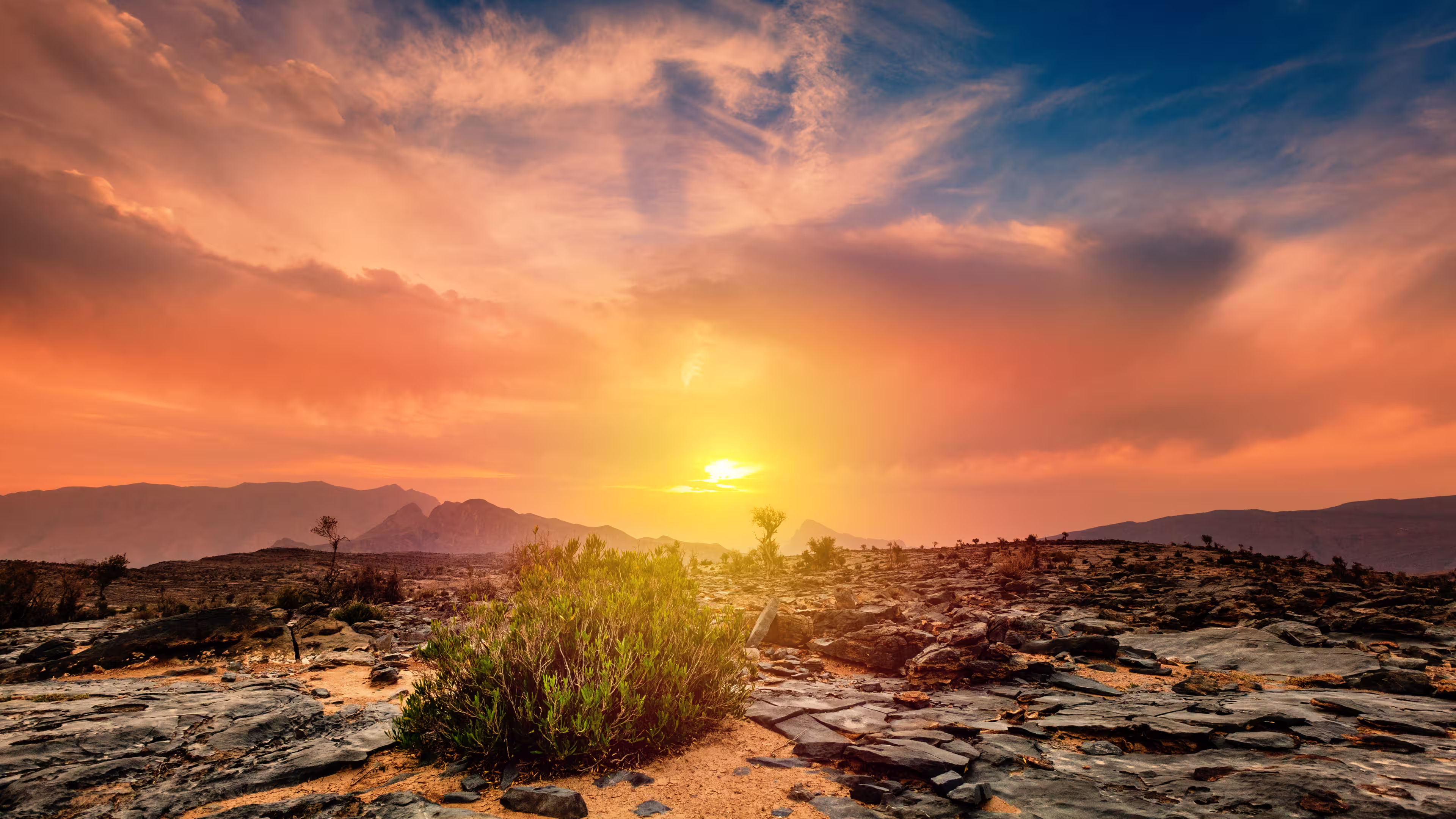 Beautiful view of sunset from a plateau on Jebel Shams Mountain in Oman