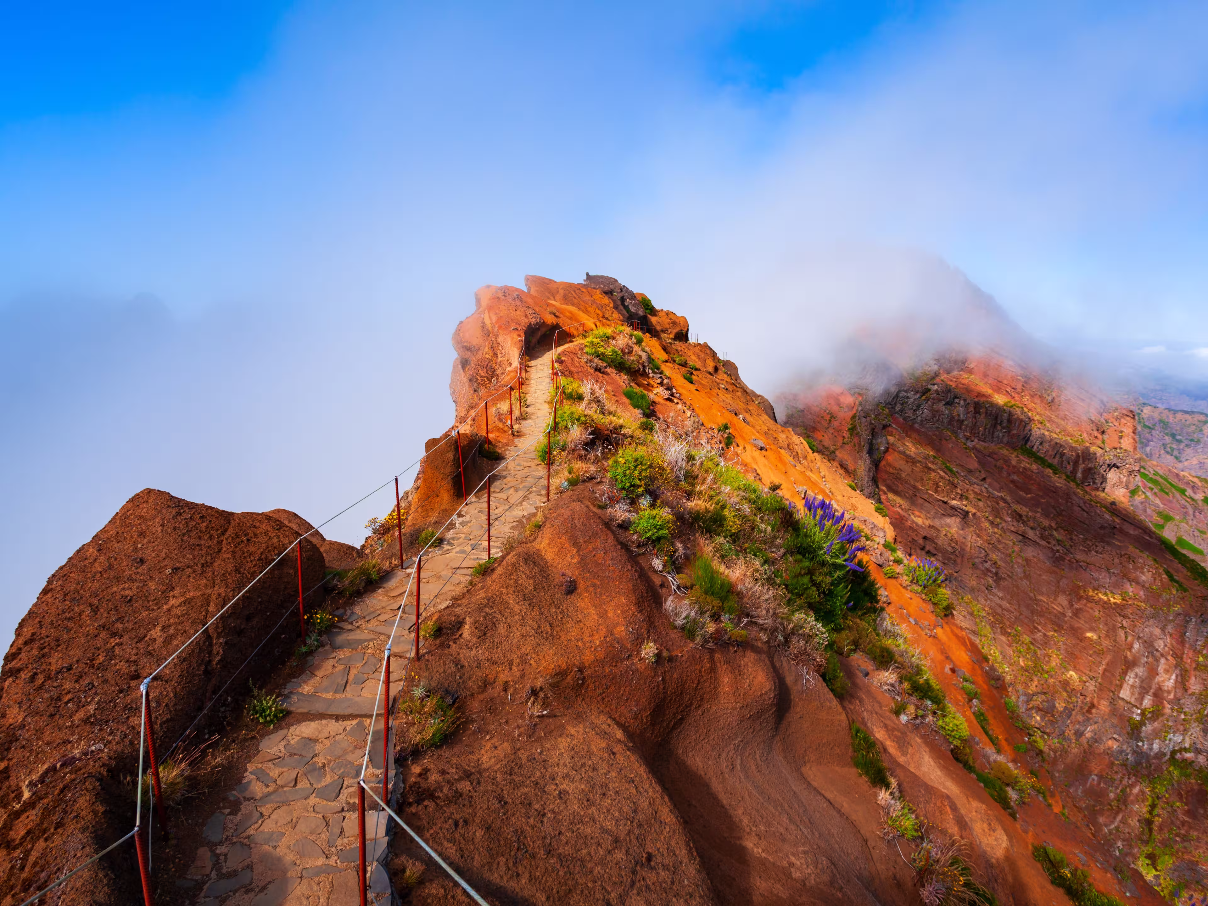 Pico do Arieiro to Pico Ruivo trek mysty landscape in Madeira island, Portugal