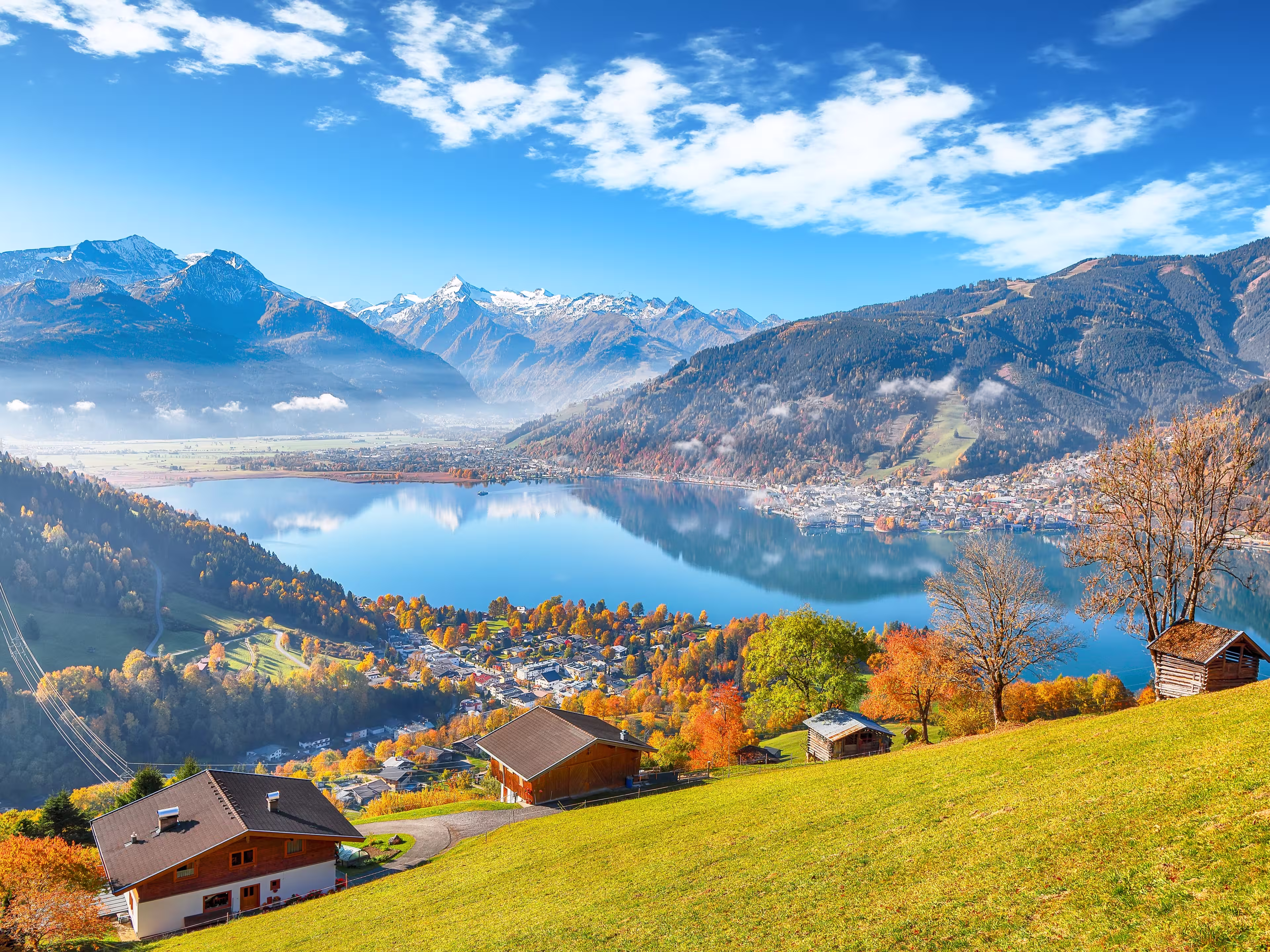 Spectacular view of the meadows and mountains around  Zell lake or Zeller See .  Location:  Zell am See,  Zell am See district, Salzburg state, Austria