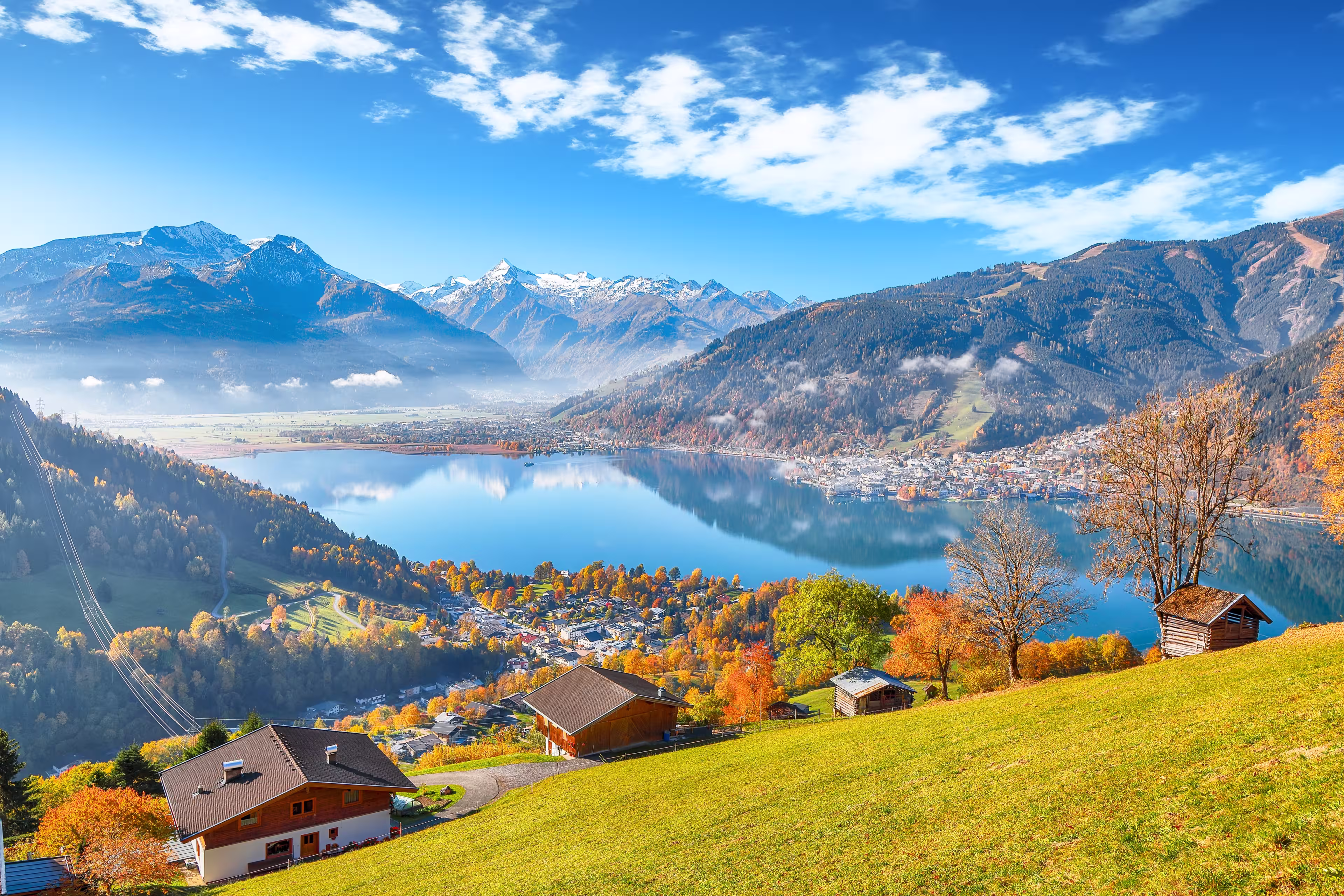 Spectacular view of the meadows and mountains around  Zell lake or Zeller See .  Location:  Zell am See,  Zell am See district, Salzburg state, Austria