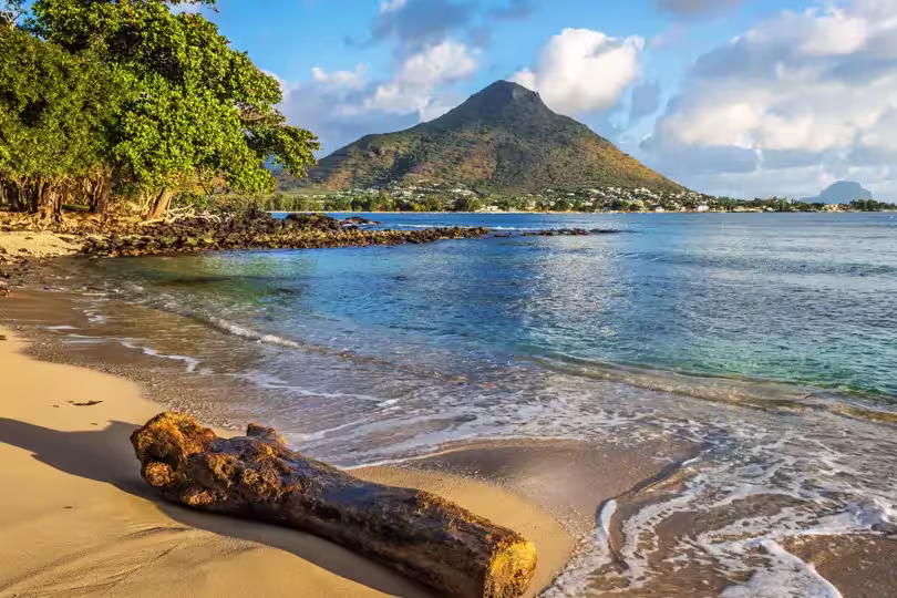 Rocky and sandy shore in Tamarin Bay, Wolmar, Flic en Flac, Mauritius Island, Indian Ocean
