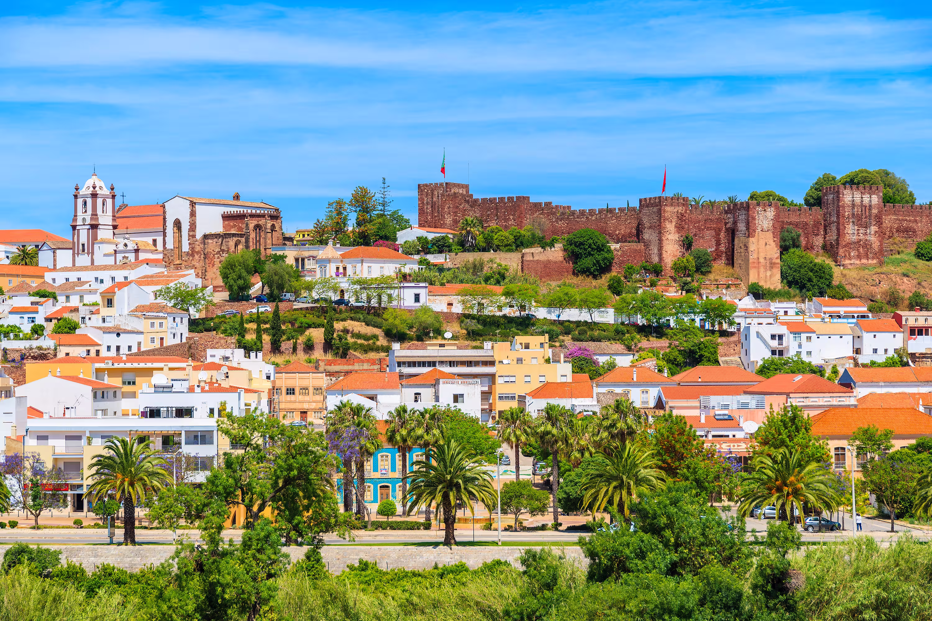 View of Silves town buildings with famous castle and cathedral, Algarve region, Portugal