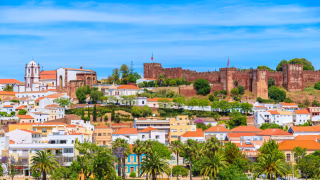 View of Silves town buildings with famous castle and cathedral, Algarve region, Portugal