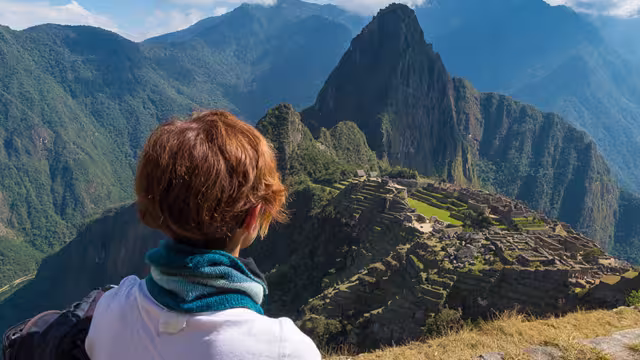 GGPIC - Woman admiring Machu Picchu from a distance