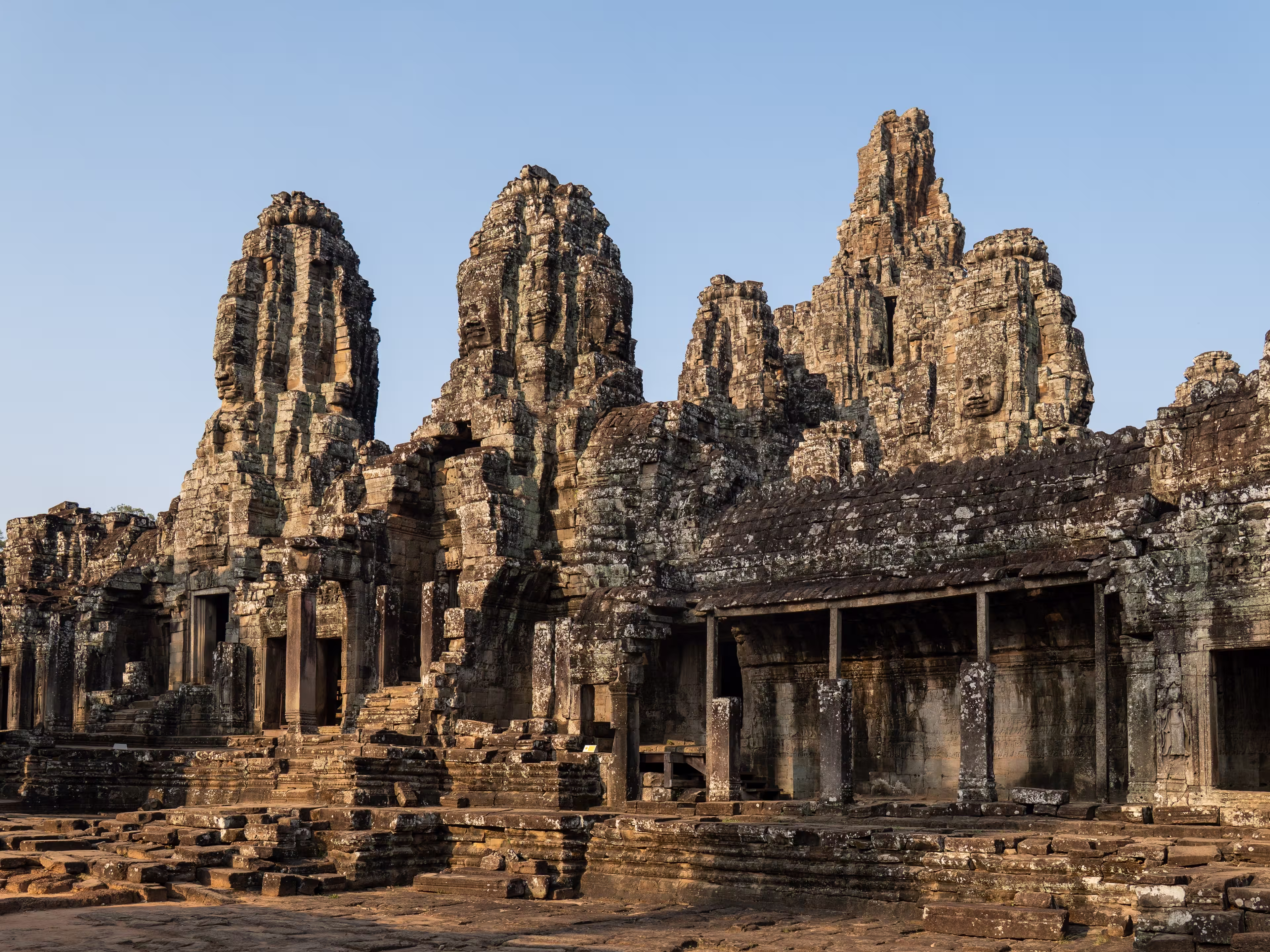 Bayon temple featuring iconic stone faces and intricate khmer architecture