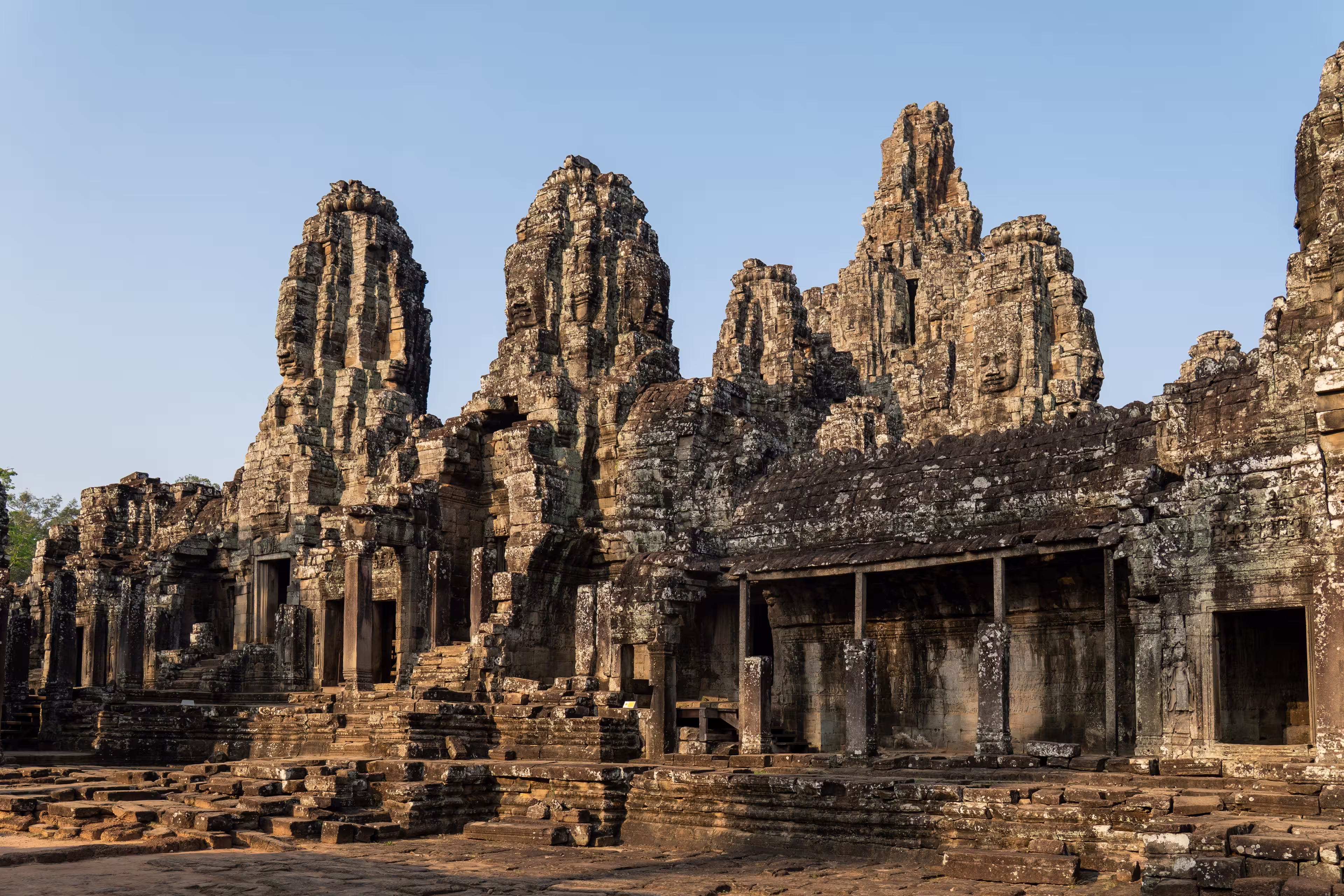 Bayon temple featuring iconic stone faces and intricate khmer architecture