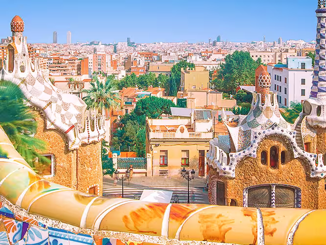 Colourful mosaic and buildings of Guell Park, Barcelona, Spain