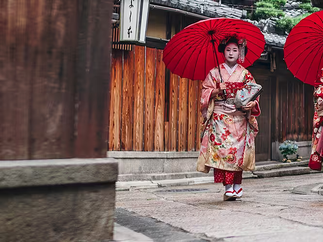 japan two geishas umbrellas