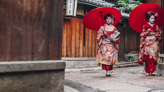 japan two geishas umbrellas