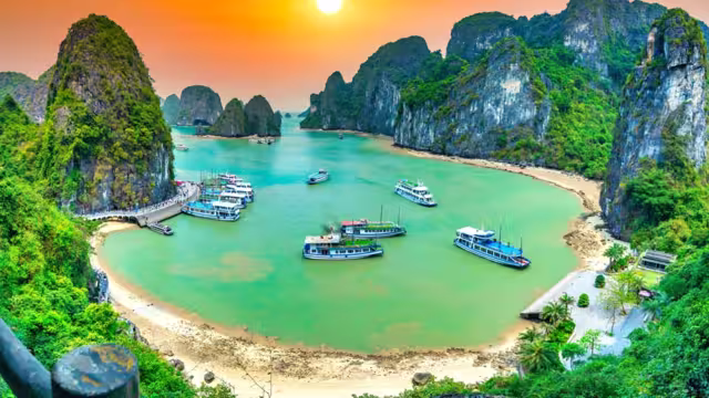 Dreamy sunset landscape Halong Bay, Vietnam view from adove. This is the UNESCO World Heritage Site, a beautiful natural wonder in northern Vietnam