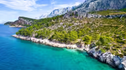 Attractive morning seascape of Adriatic sea. Marvelous summer view of small beach in famous resort - Tucepi, Makarska Croatia, Europe. Beautiful world of Mediterranean countries.