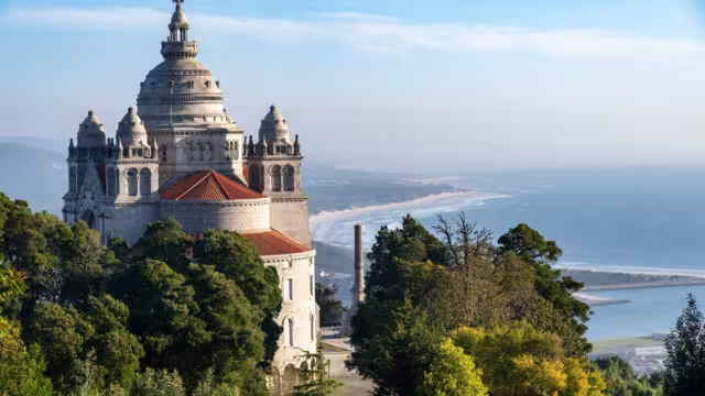Viana do Castelo, Portugal-October 7, 2023; Sanctuary of the Sacred Heart of Jesus or Sanctuary of Santa Luzia located at the top of Mount Santa Luzia with area beaches in background
