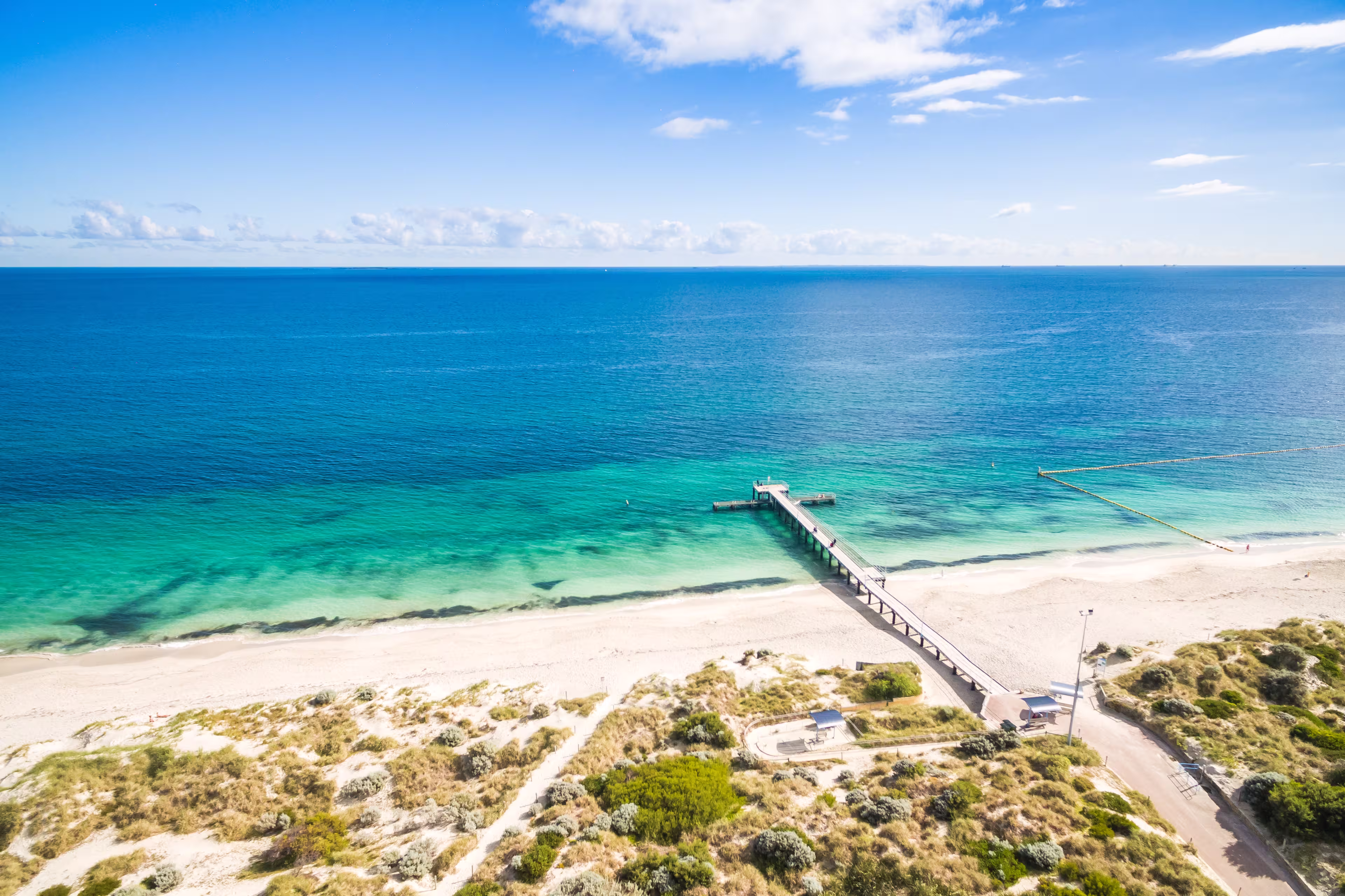 Aerial photograph of the jetty at Coogee Beach in Perth, Western Australia, Australia, on a beautiful sunny afternoon.