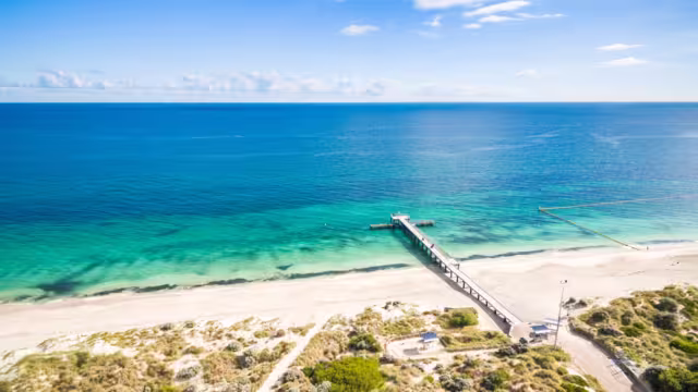 Aerial photograph of the jetty at Coogee Beach in Perth, Western Australia, Australia, on a beautiful sunny afternoon.