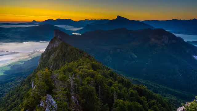 Foggy sunrise over Salzkammergut mountains