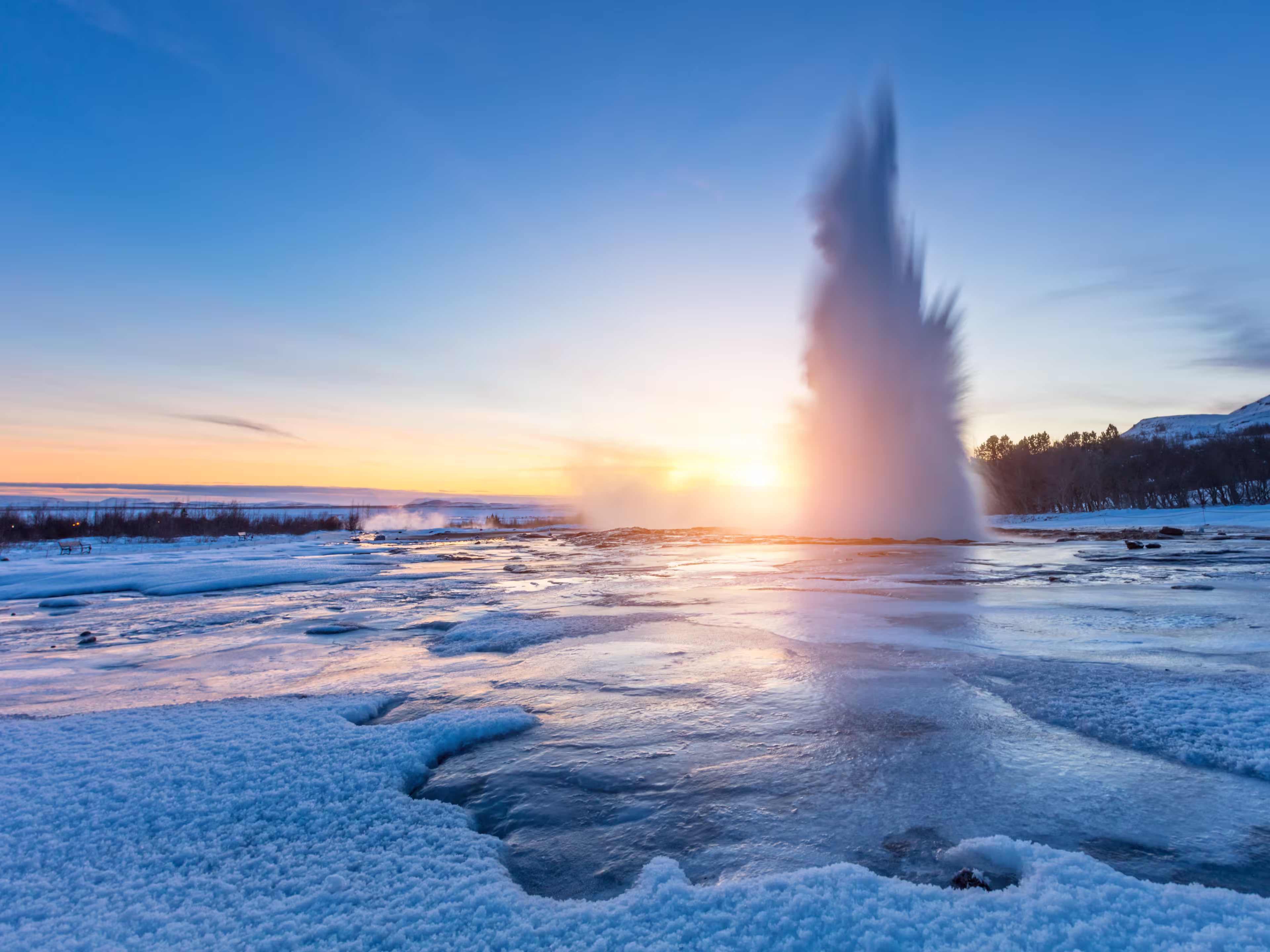 Famous Geysir in Iceland in beautiful sunset light. One of the most famous natural heritage on Iceland.