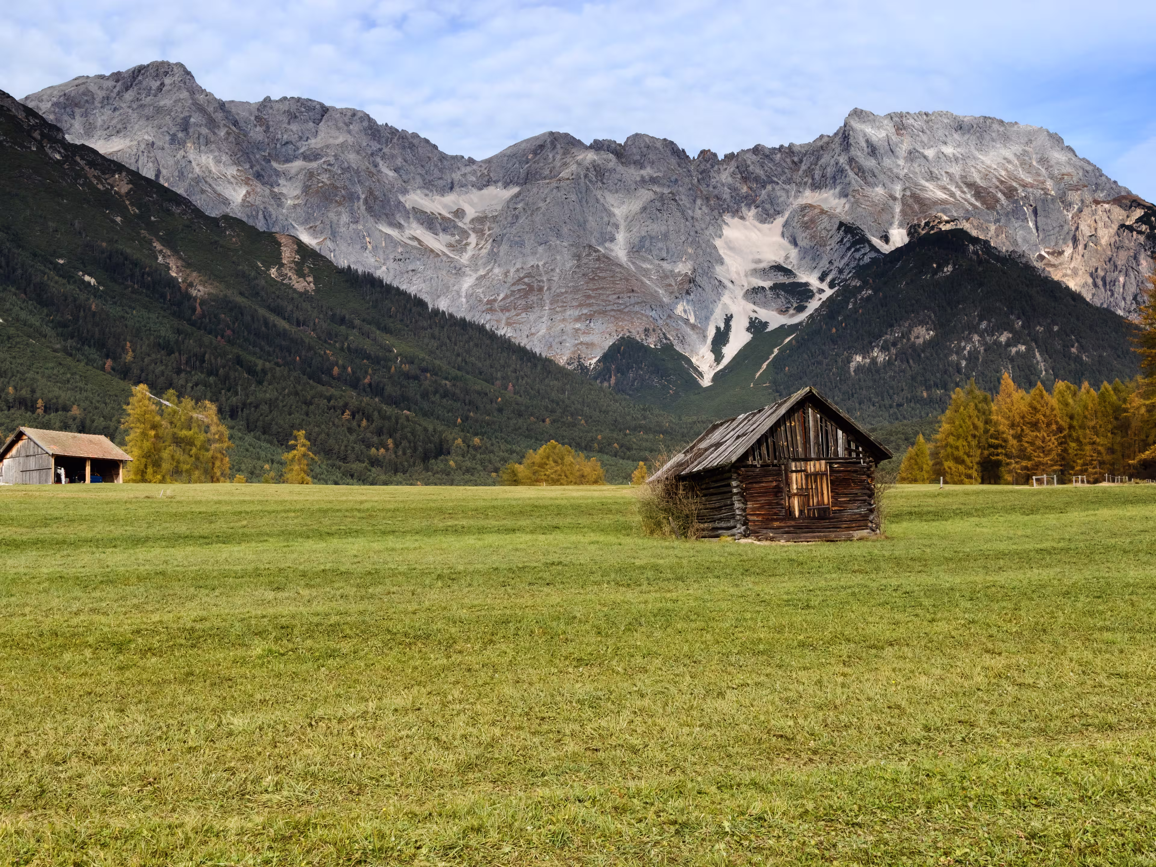 Old wooden hut in mountain at rural fall landscape. Mieminger Plateau, Austria, Europe.