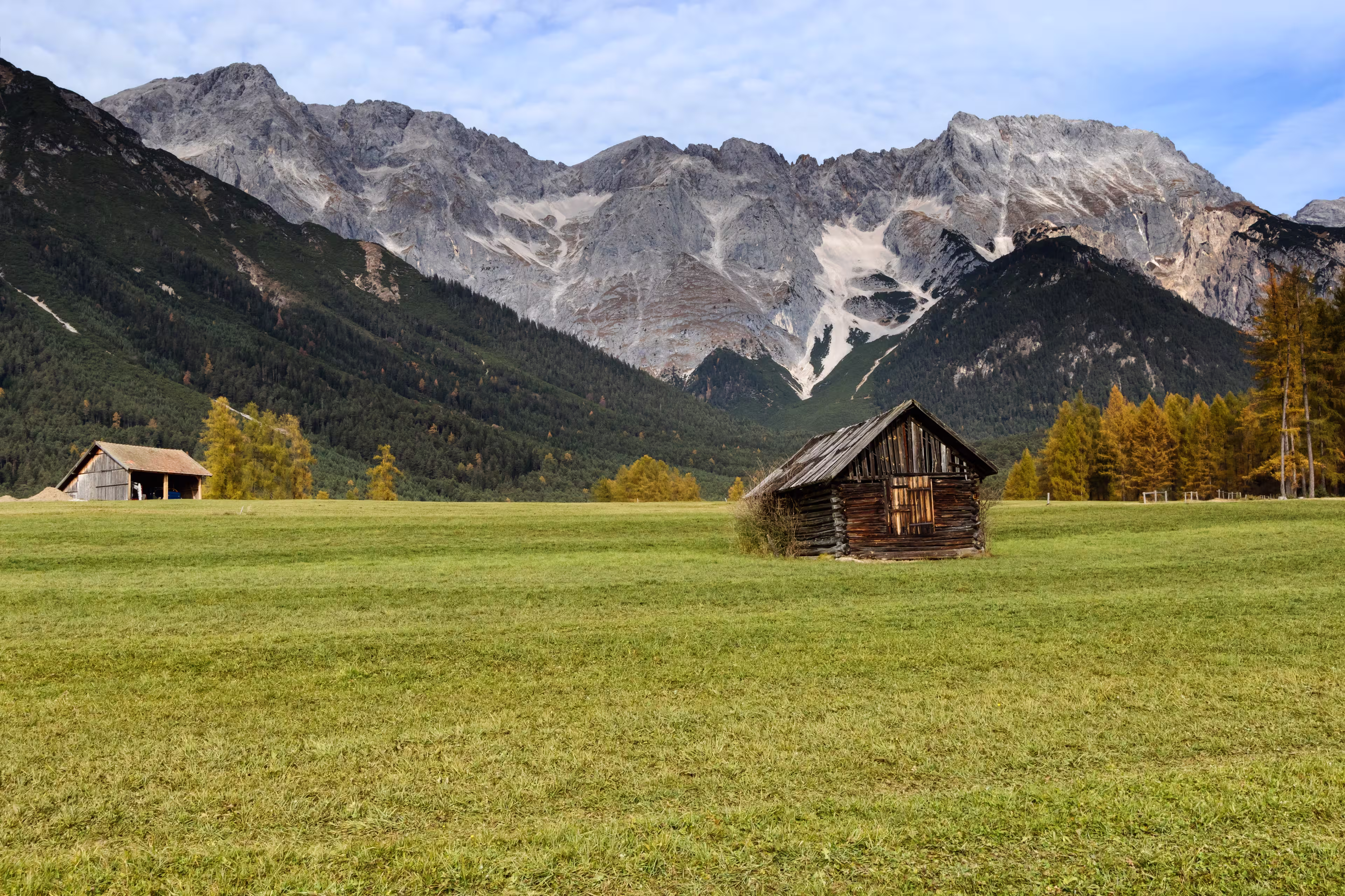 Old wooden hut in mountain at rural fall landscape. Mieminger Plateau, Austria, Europe.