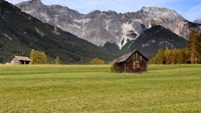 Old wooden hut in mountain at rural fall landscape. Mieminger Plateau, Austria, Europe.