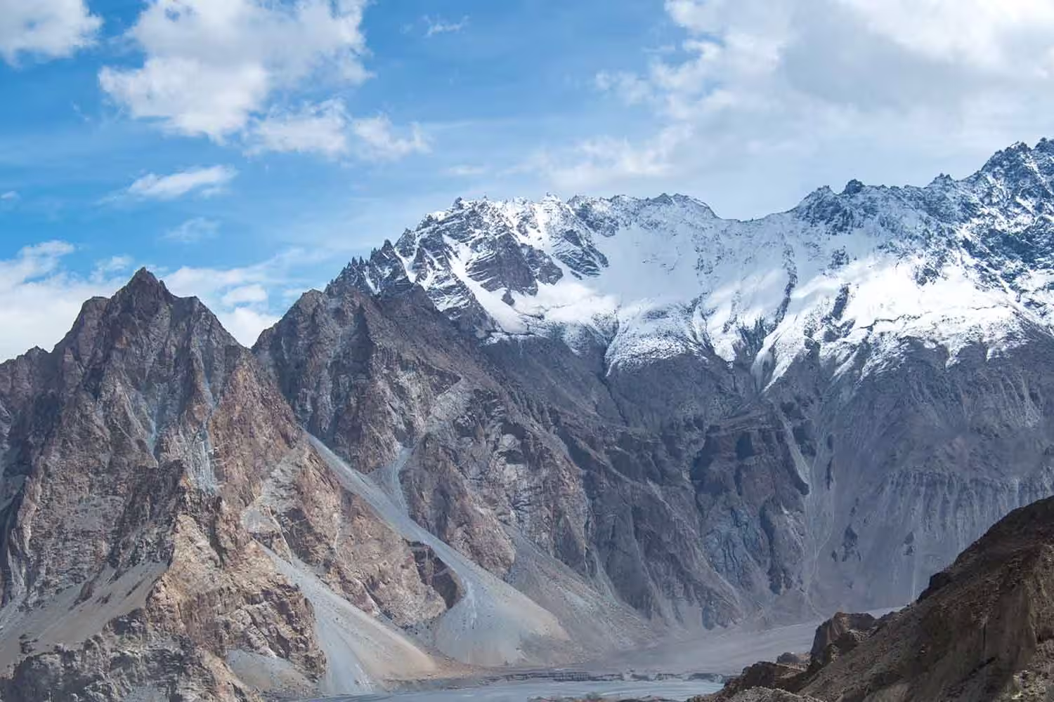 Rocky snow capped mountain range in the Hunza Valley