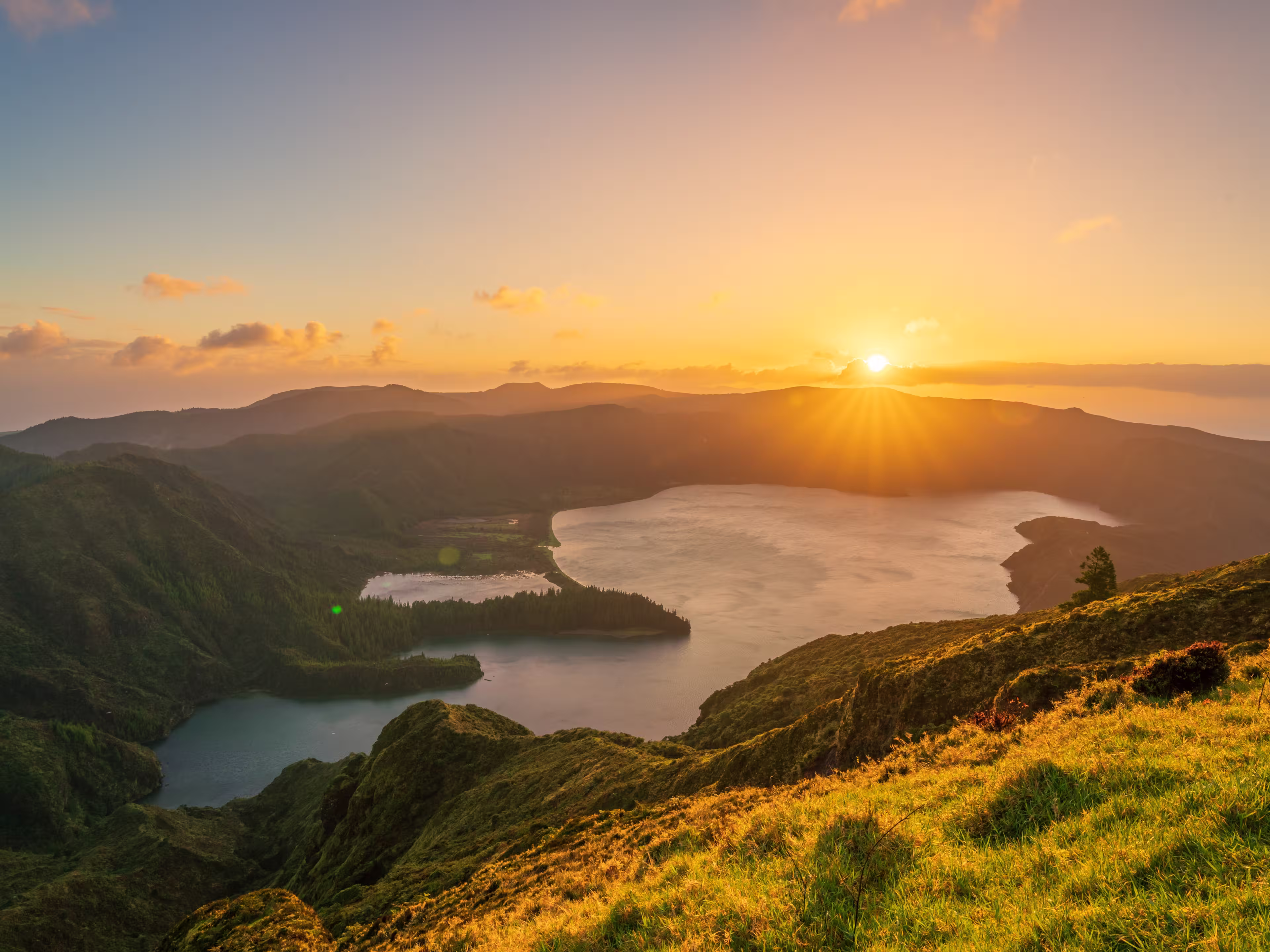 Aerial view of the volcanic lake,  Lagoa do Fogo on Sao Miguel Island at sunrise, Azores, Portugal
