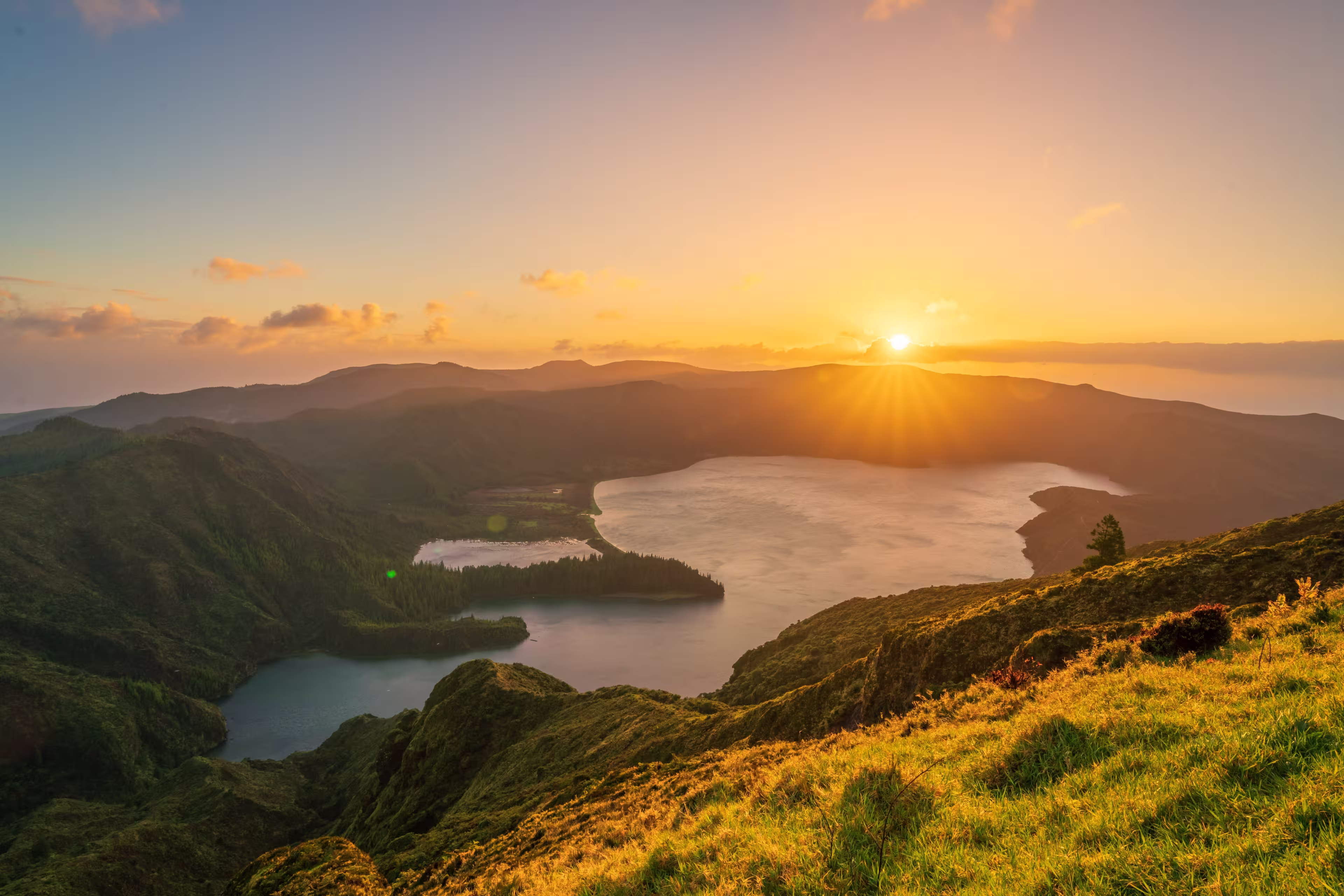 Aerial view of the volcanic lake,  Lagoa do Fogo on Sao Miguel Island at sunrise, Azores, Portugal