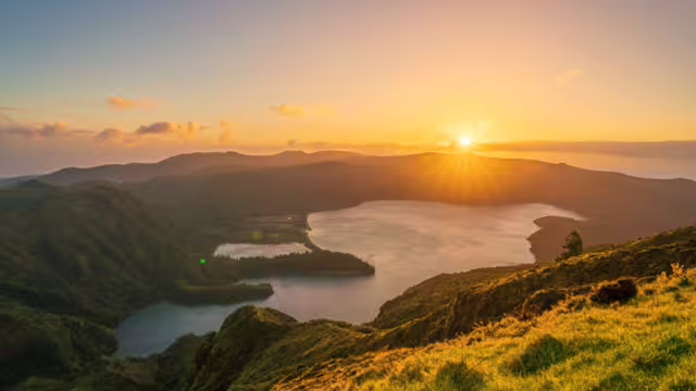 Aerial view of the volcanic lake, Lagoa do Fogo on Sao Miguel Island at sunrise, Azores, Portugal